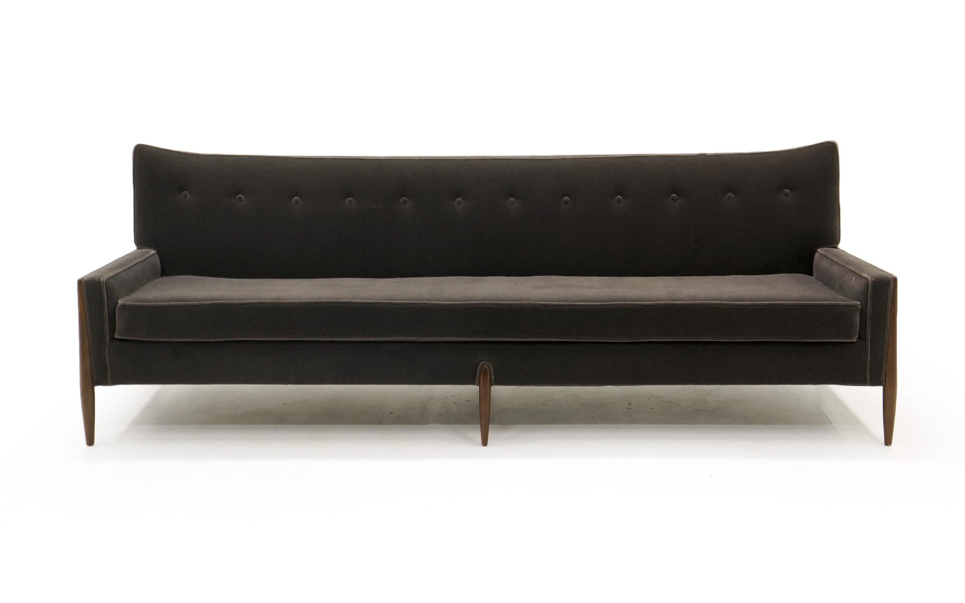 Sculptural sofa by Jules Heumann for Metropolitan. Expertly restored and reupholstered in a beautiful charcoal grey mohair fabric. The legs are reminiscent of designs by Vladimir Kagan. This striking design is also very comfortable.