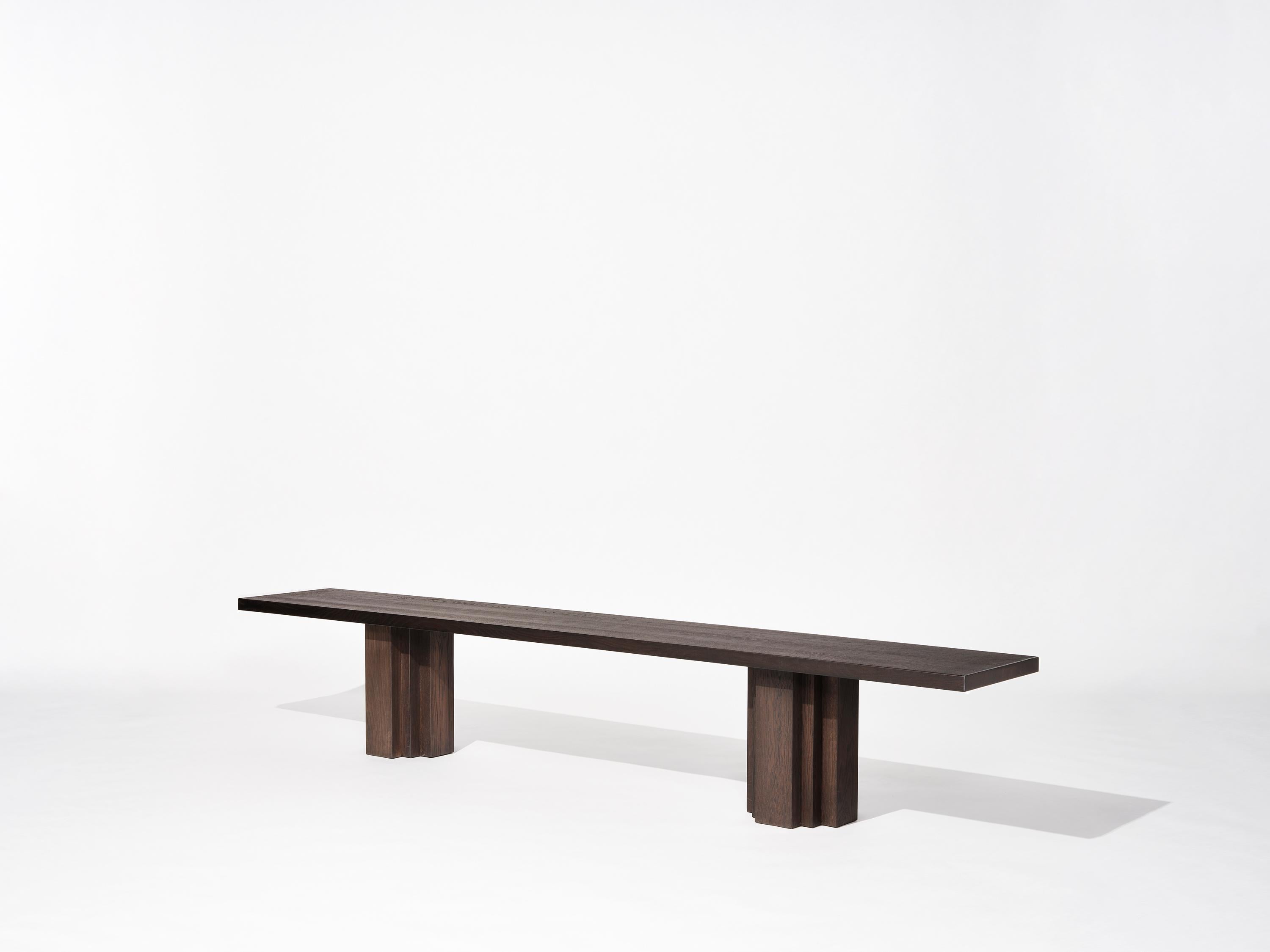 The Brut collection takes cues from Brutalism and Amsterdam School architecture. A balance of raw materiality and subdued forms with geometrically expressive detailing. The Brut bench functions as seating matching the Brut table or as an individual