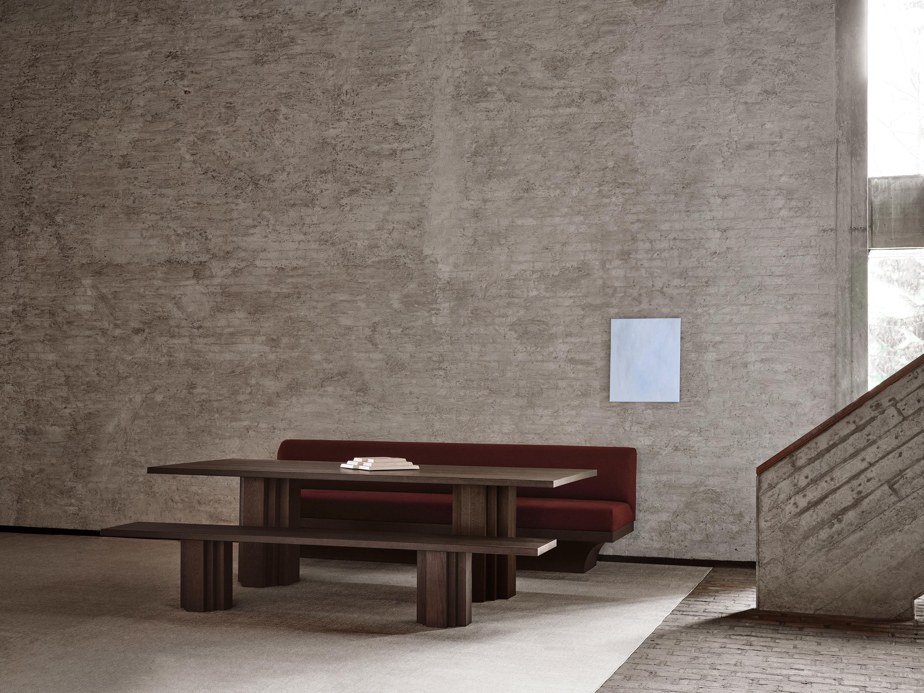 The Brut collection takes cues from Brutalism and Amsterdam School architecture. A balance of raw materiality and subdued forms with geometrically expressive detailing. The Brut bench functions as seating matching the Brut table or as an individual