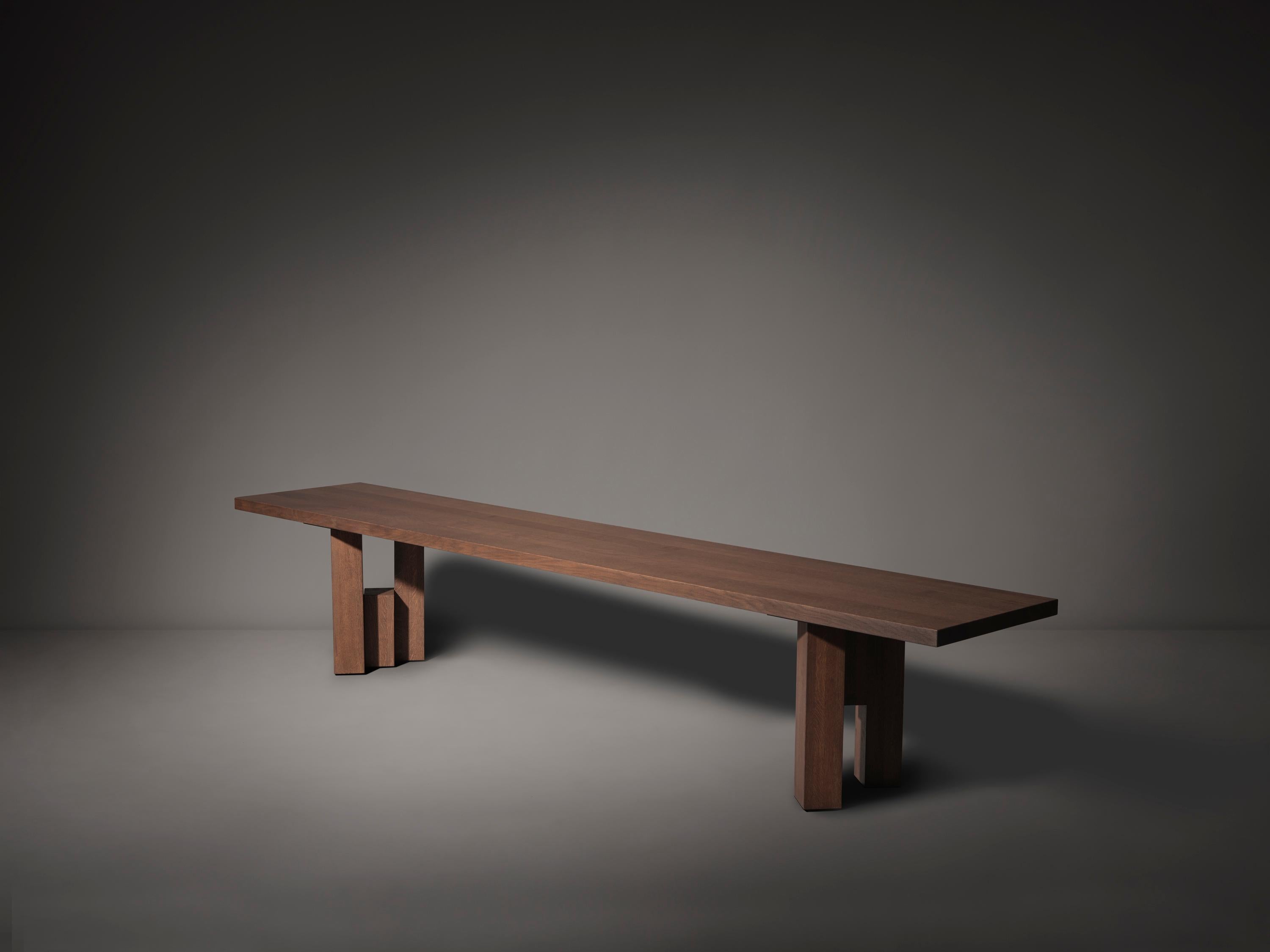 The Fenestra bench takes cues from Brutalism and Amsterdam School architecture and made out of solid hardwood. The bench is designed to match the Fenestra dining table but is also as a separate product available. The bench is designed by Aad Bos and