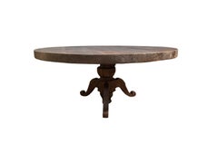 Tavolo da pranzo scultoreo in legno massiccio di teak con venatura naturale espressiva