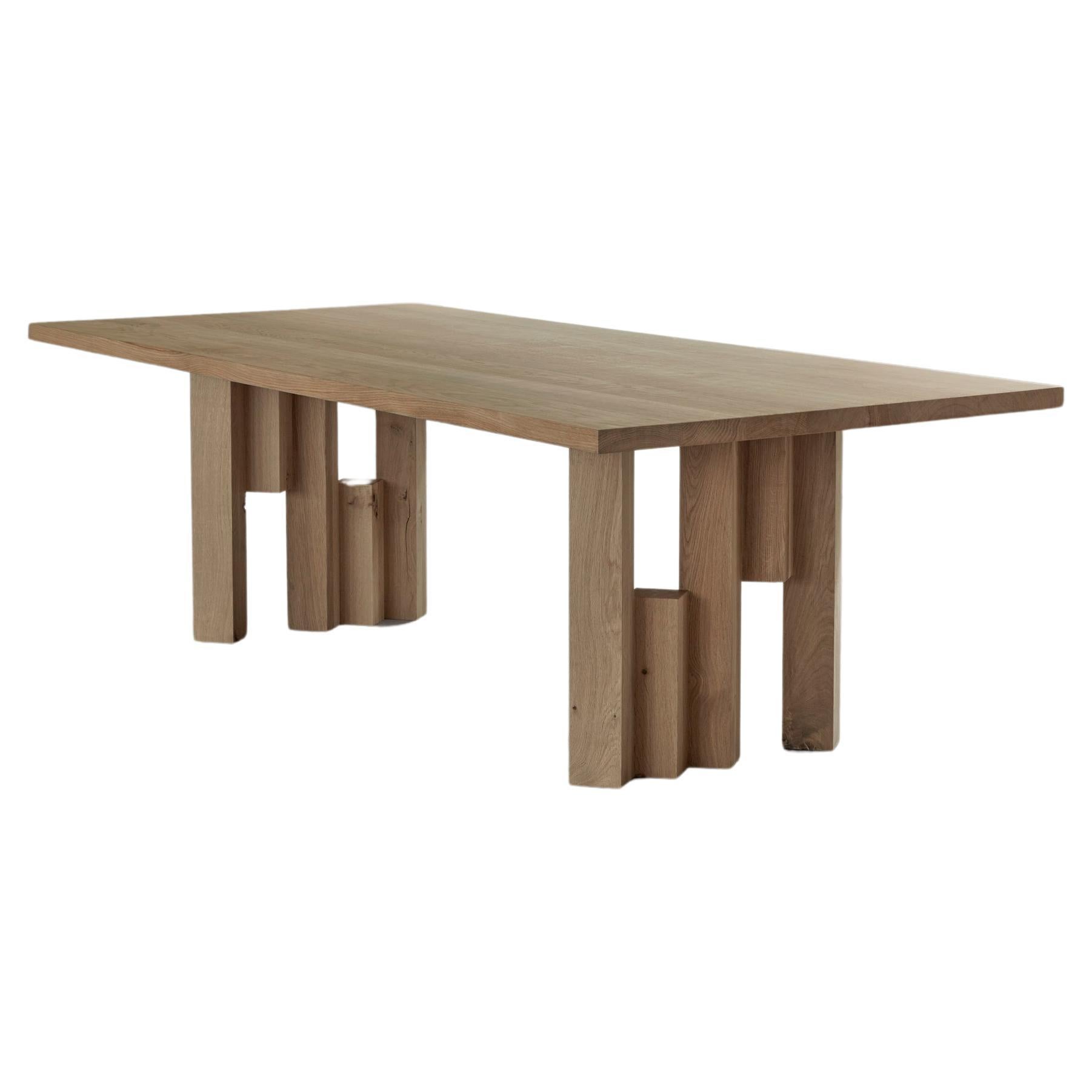 Sculptural solid Oak wooden Fenestra dining table For Sale