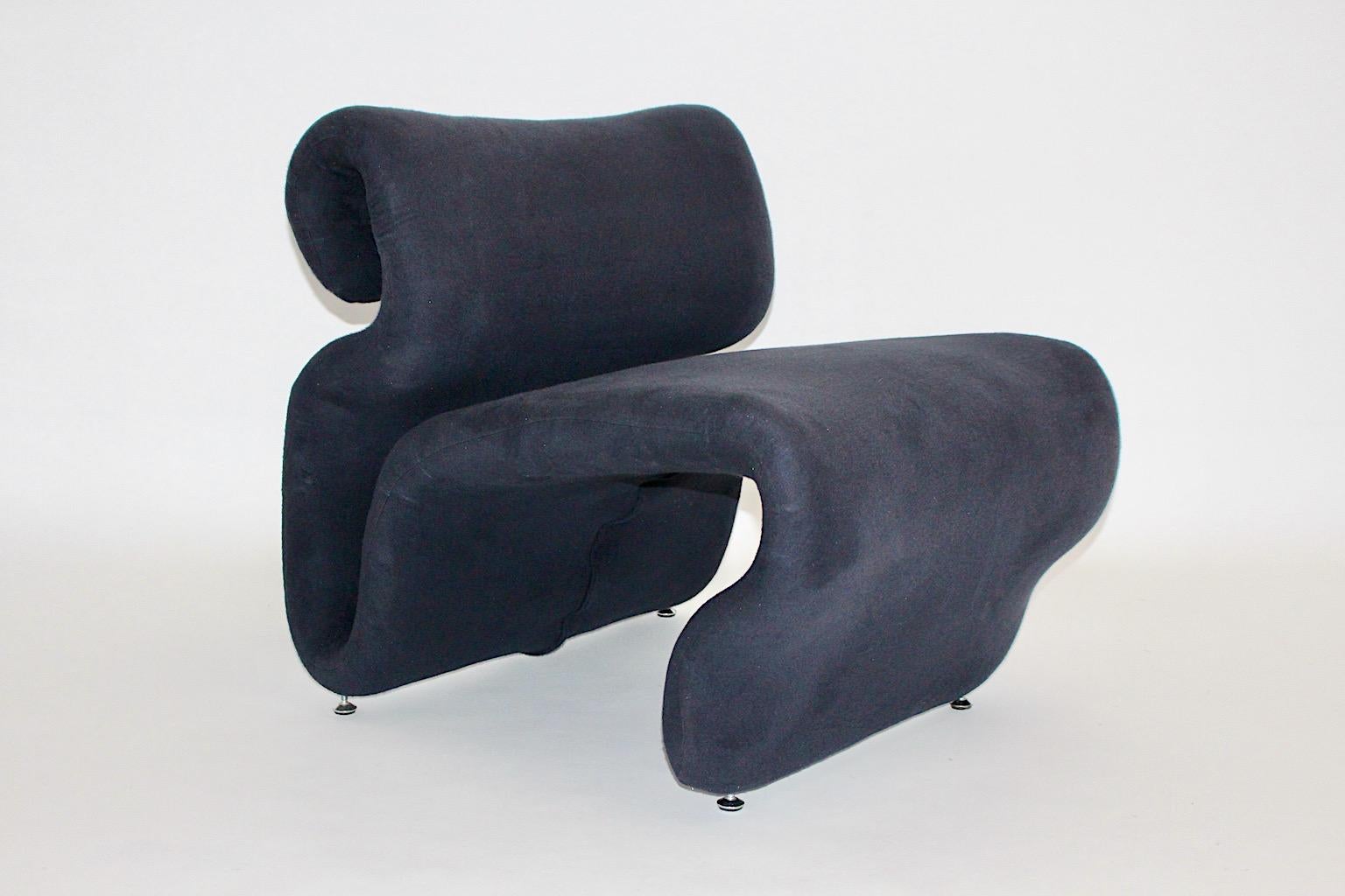Sculptural Space Age vintage lounge chair Etcetera by Jan Ekselius from blue stretch fabric 1970s Sweden.
An amazing curved sculptural and freestanding lounge chair model Etcetera by Jan Ekselius 1970s Sweden, which comes along with an upholstered