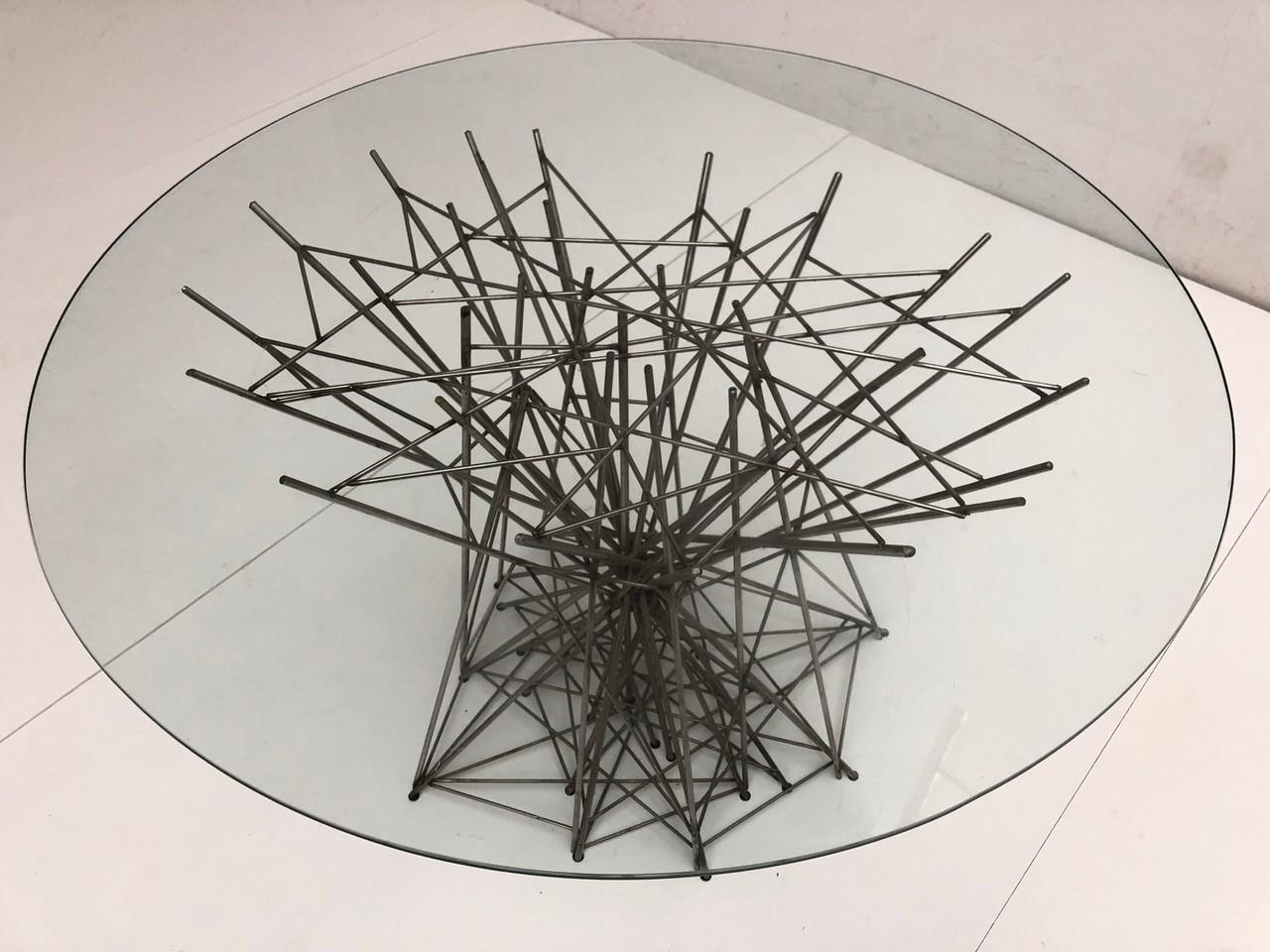 Beautiful, unique, one off sculptural form dining table base from the early 1970s period constructed from a series of interlocking welded stainless steel rods which create a wonderful conplex interplay of form, reflection, light and shadow.

The