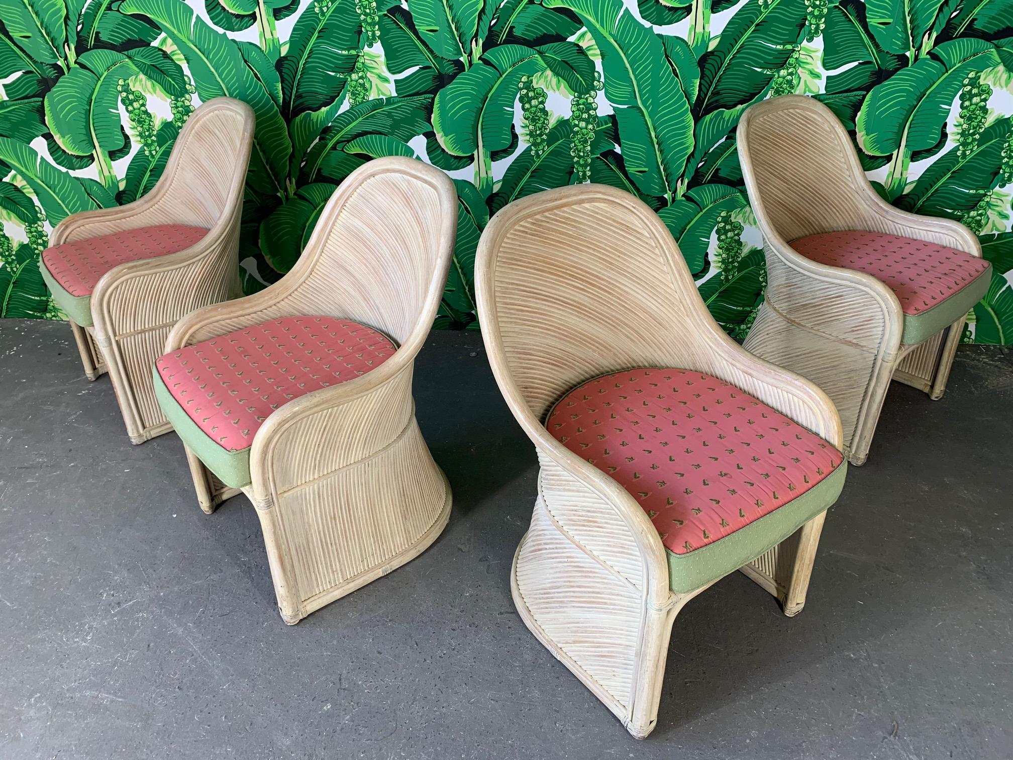 Set of 4 dining chairs by Henry Link feature unique sculptural shape and wrapped in split reed rattan in an artistic pattern after Gabriella Crespi. Very good condition with minor imperfections consistent with age. Upholstery in excellent condition.