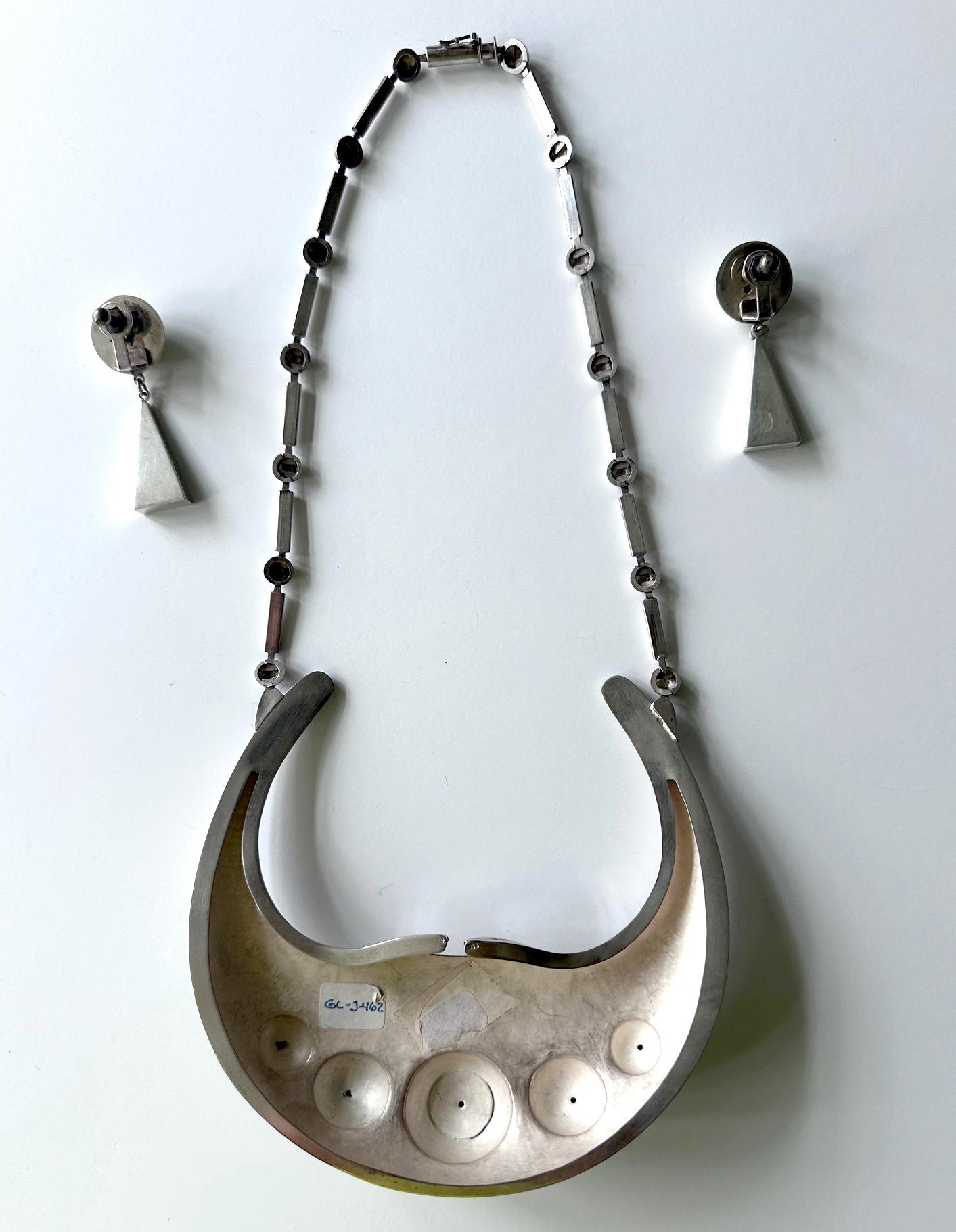 Moderne Collier et boucles d'oreilles sculpturaux en argent par Graziella Laffi en vente