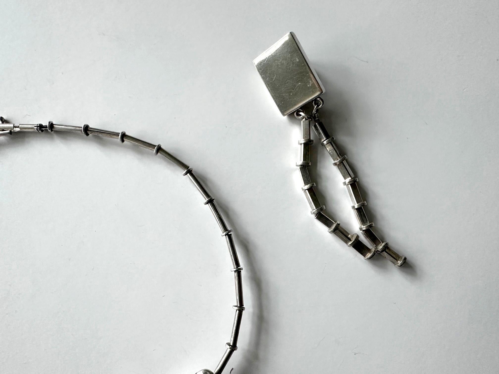 Fine XX secolo Suite di collane e orecchini scultorei in argento di Graziella Laffi in vendita