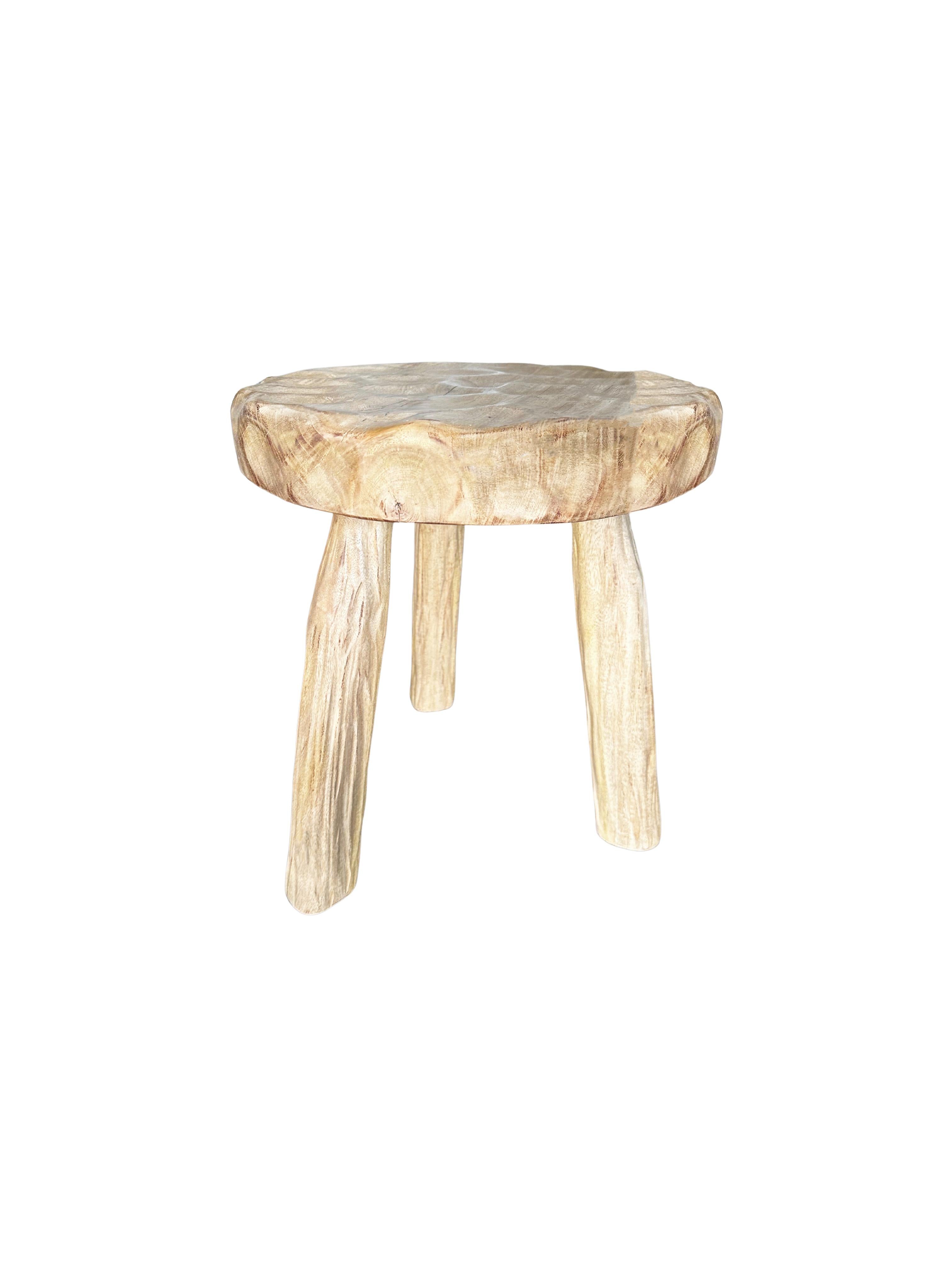 Indonesian Sculptural Stool Solid Mango Wood, Hand-Hewn Detailing, Modern Organic For Sale