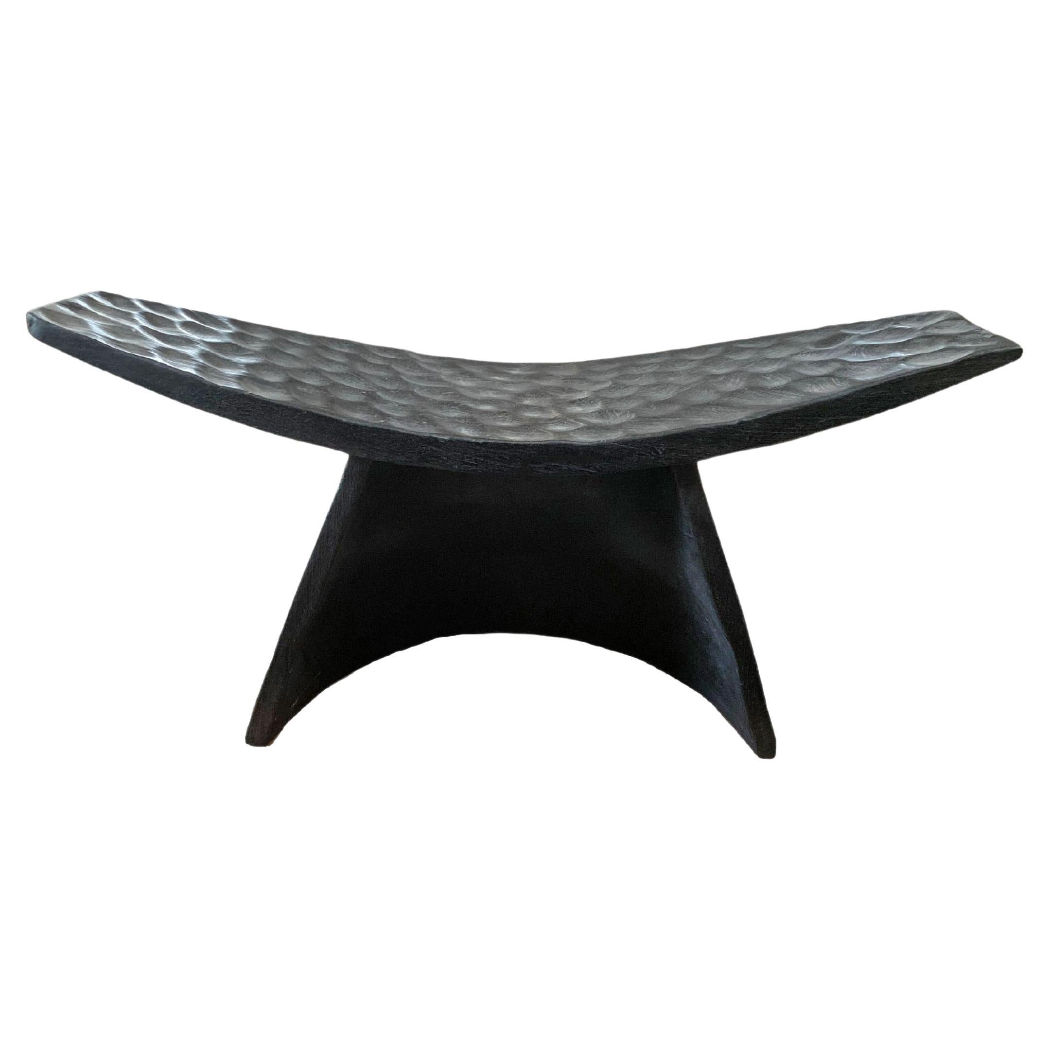 Sculptural Stool with Curved Seat & Hand Hewn Detailing, Burnt Finish For Sale