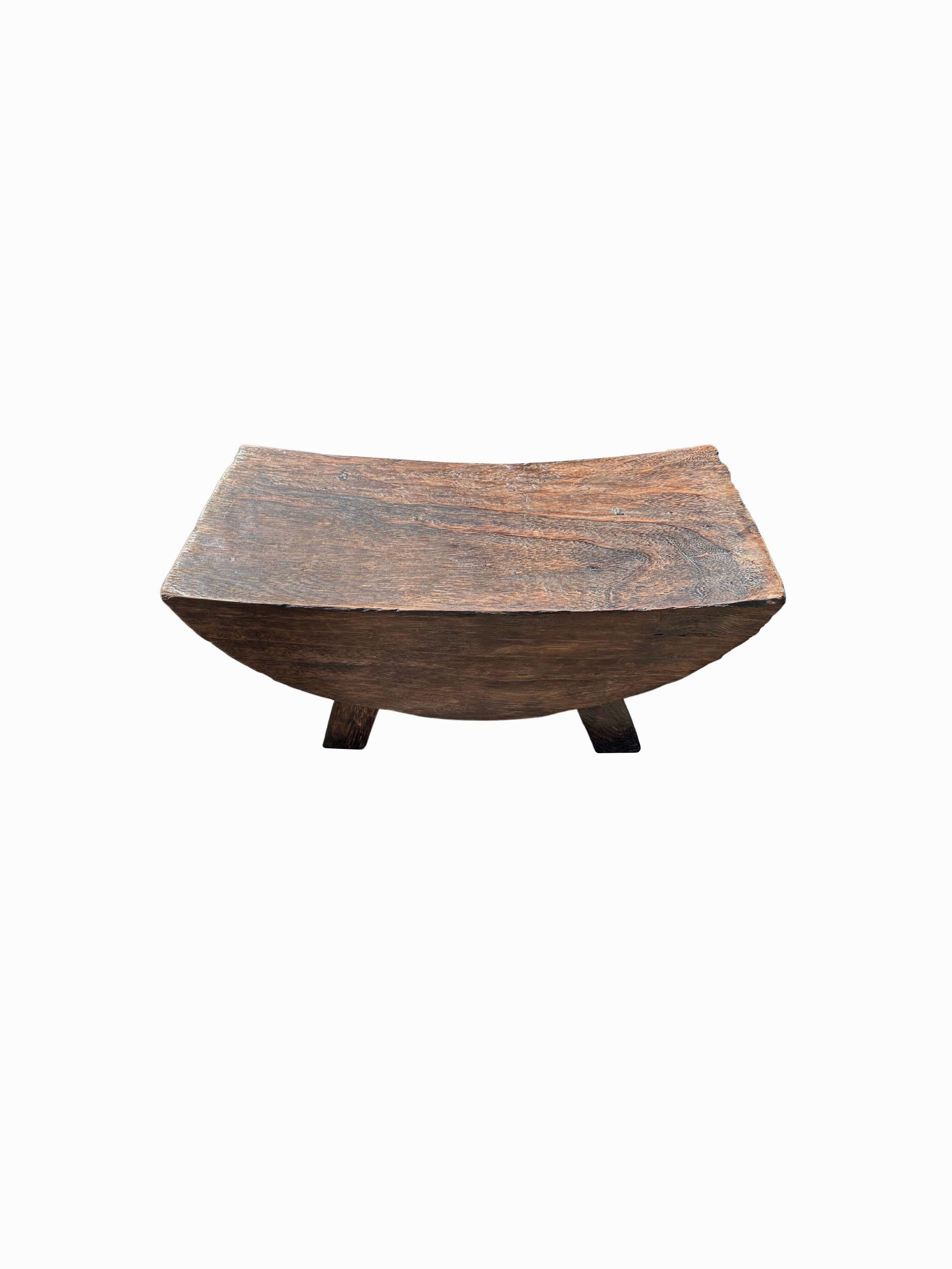 Indonesian Sculptural Stool with Curved Seat Suar Wood  For Sale