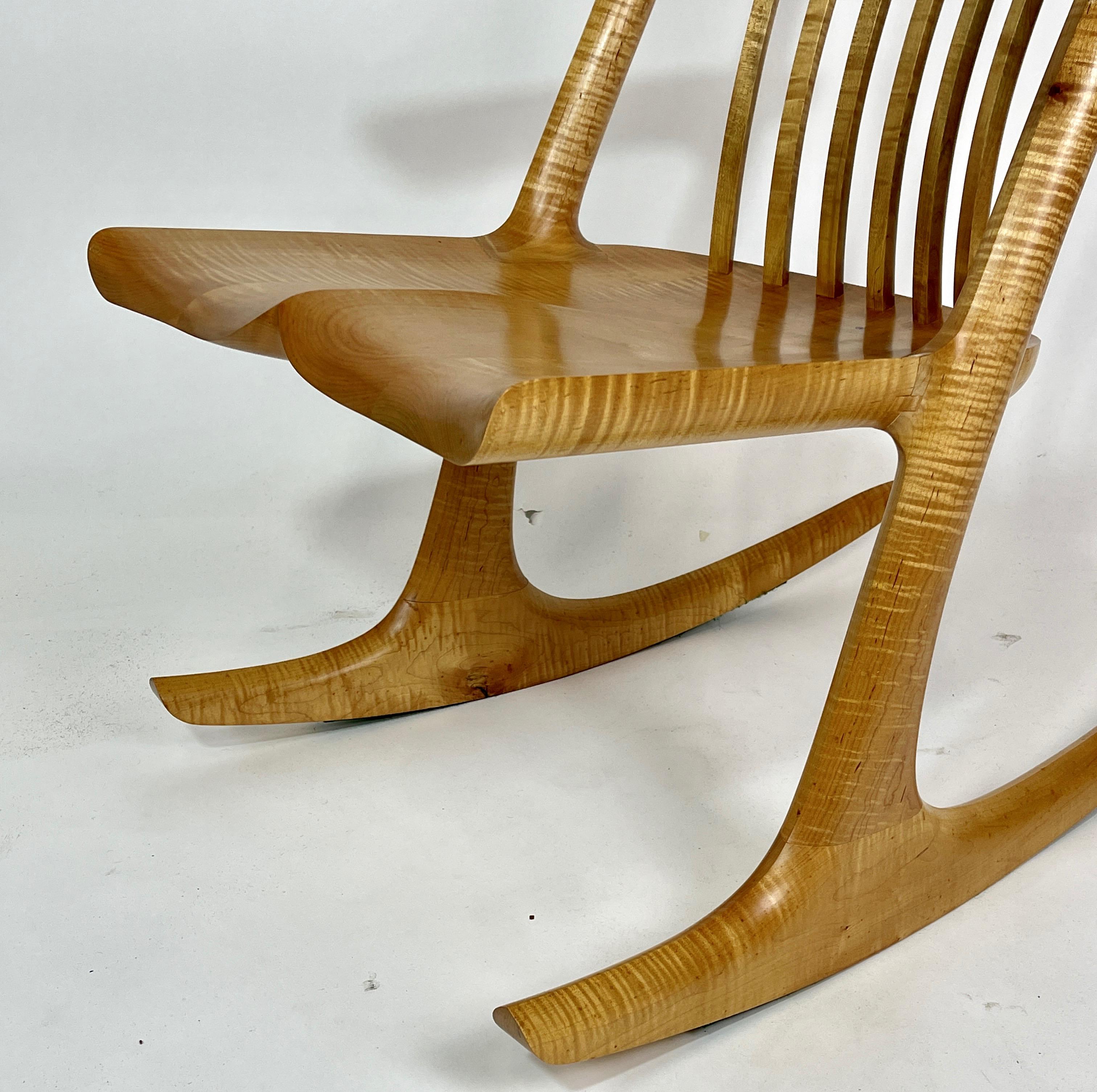 Amazing sleek handcrafted solid curly maple rocker, or console. This one of a kind piece was made by master craftsman Michael Gregorio of upstate NY.

About Michael Gregorio: In a one car garage at age 13, with a few hand tools, determination and