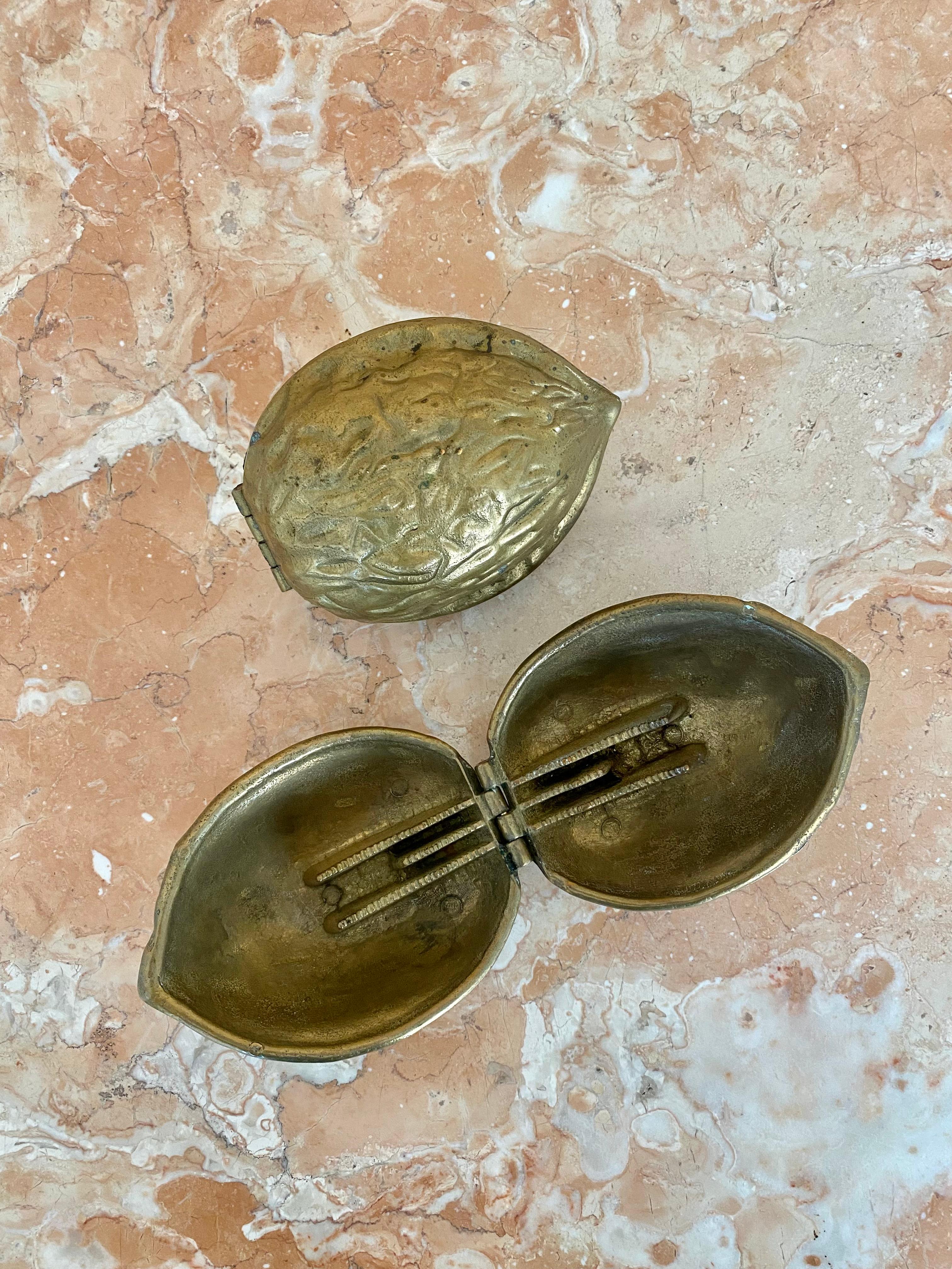 Extra large, heavyweight, sculptural cast brass walnut paperweights or nutcrackers that are truly art. We love these on a desk as whimsical display pieces.

With the large sizes, and functionality (they crack nuts well), these are the perfect gifts