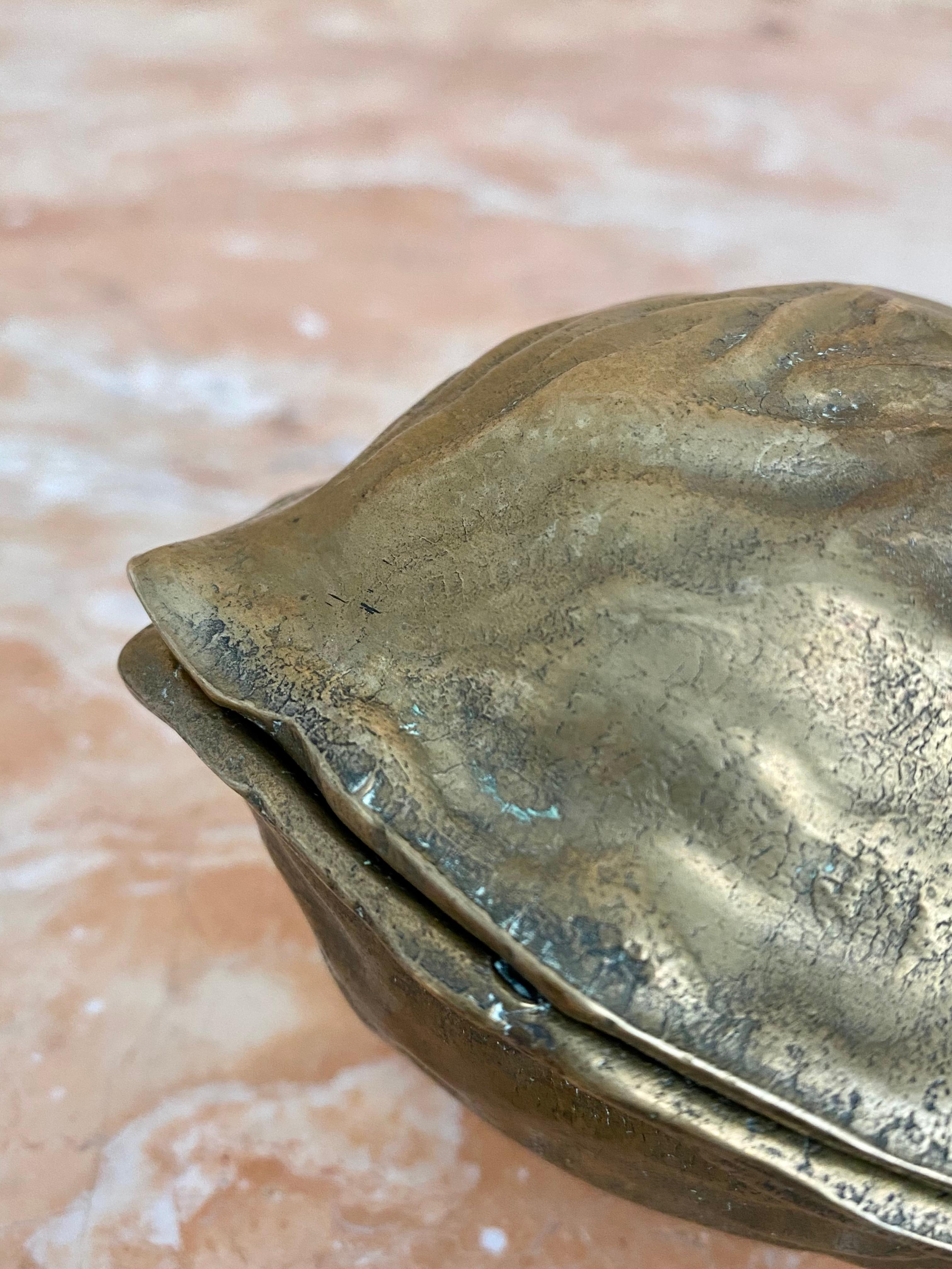20th Century Sculptural Surrealist Cast Brass Walnut Nutcracker Paperweights, A Pair For Sale