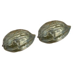 Sculptural Surrealist Cast Brass Walnut Nutcracker Paperweights, A Pair