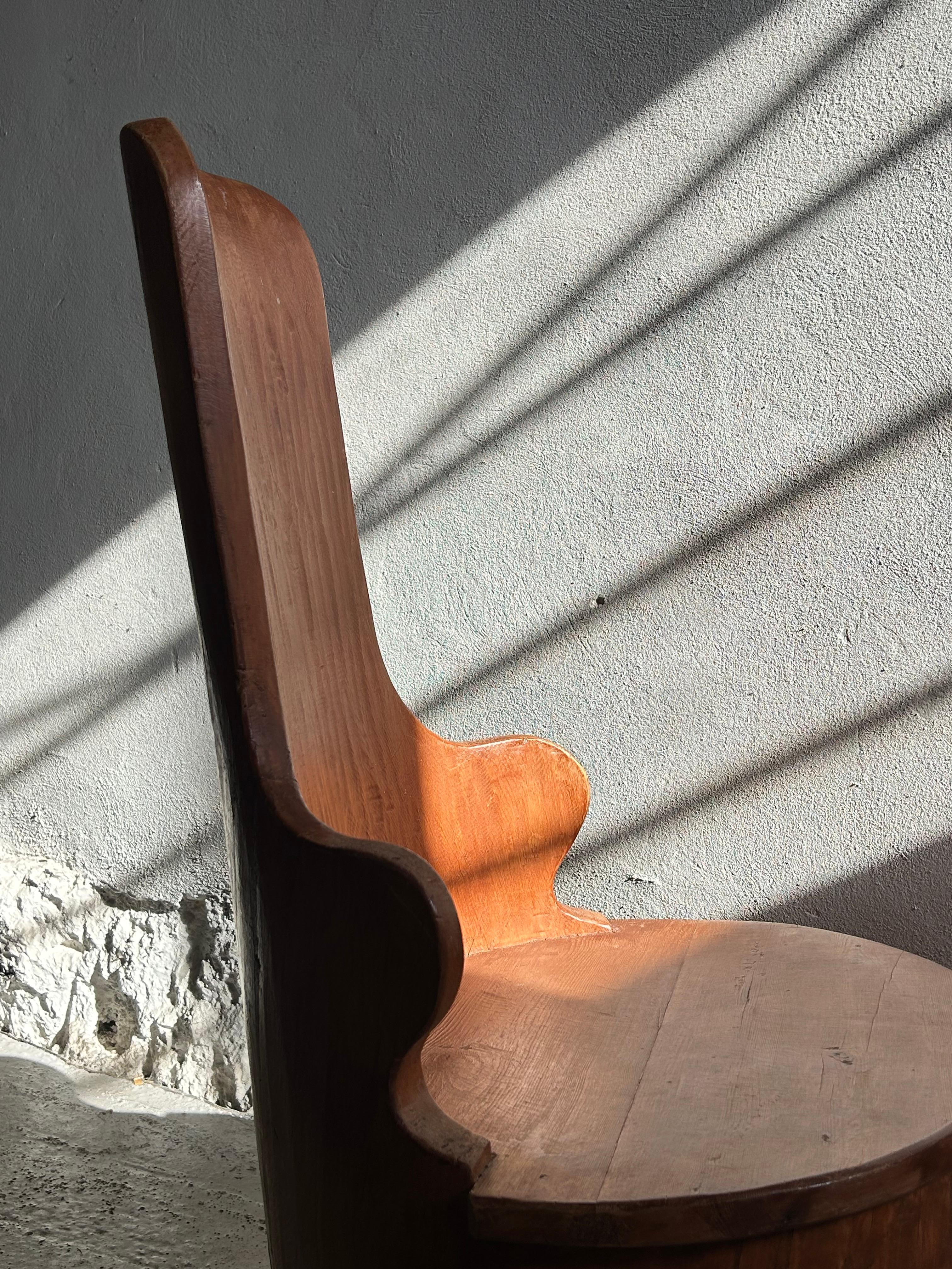 Pine Sculptural Swedish Kubbestol, Early 20th Century Folk Art Chair in Solid Wood For Sale