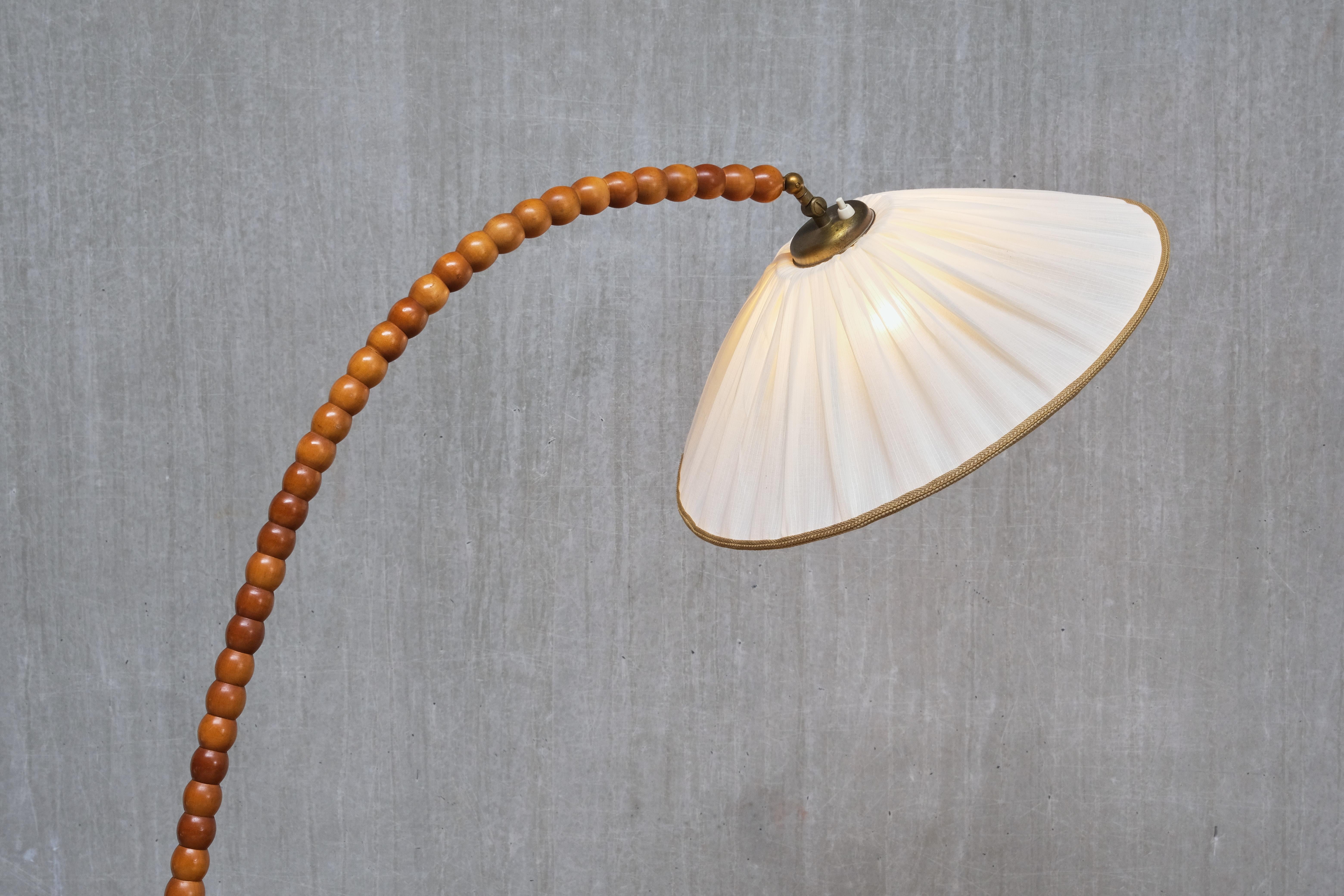 Mid-20th Century Sculptural Swedish Modern Floor Lamp with Table & Turned Orb Arm, Late 1930s For Sale