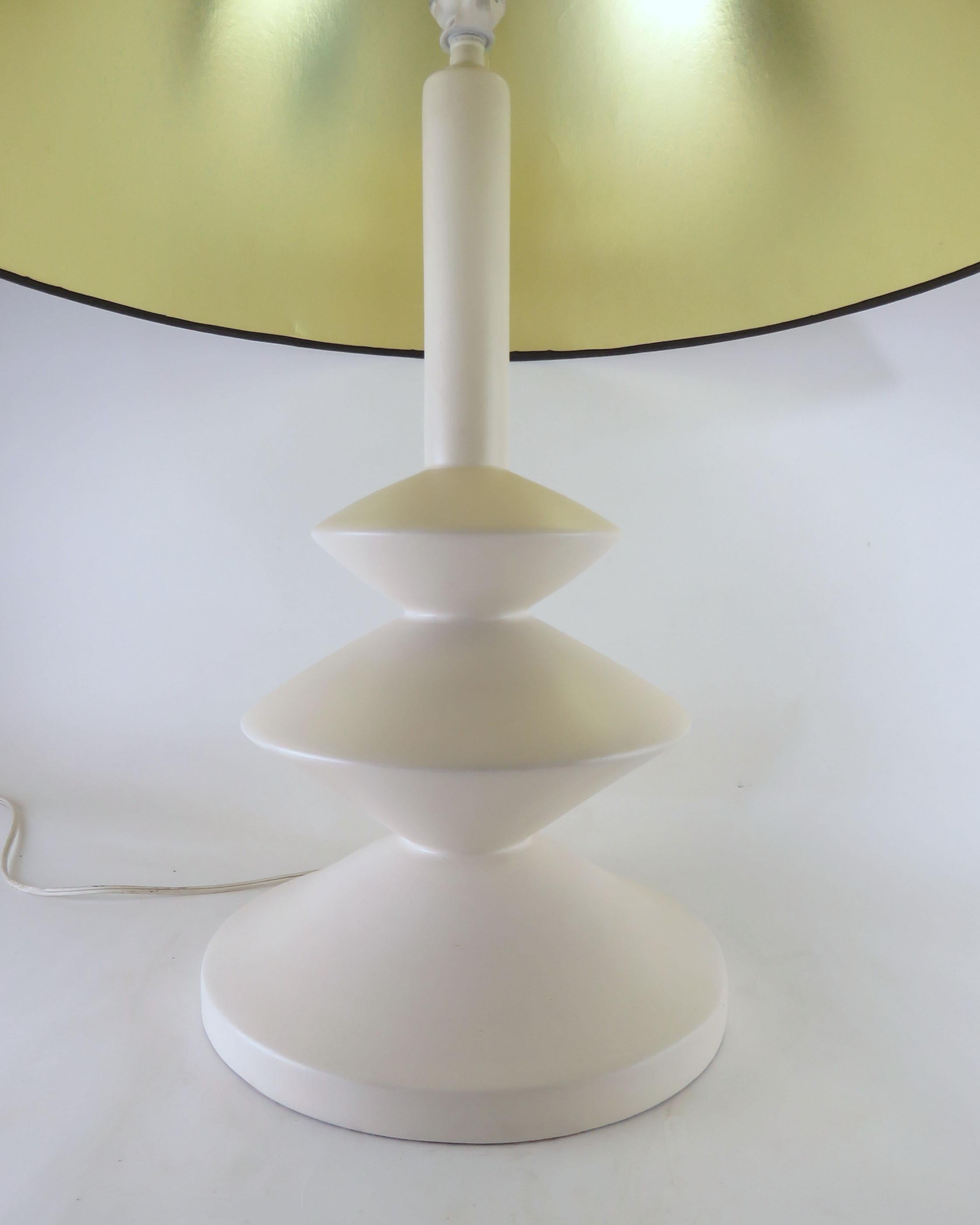 Sculptural table lamp in smooth plaster by Sirmos Lighting, circa 1970s, after a design by Alberto & Diego Giacometti for Jean Michel Frank. Shade (24