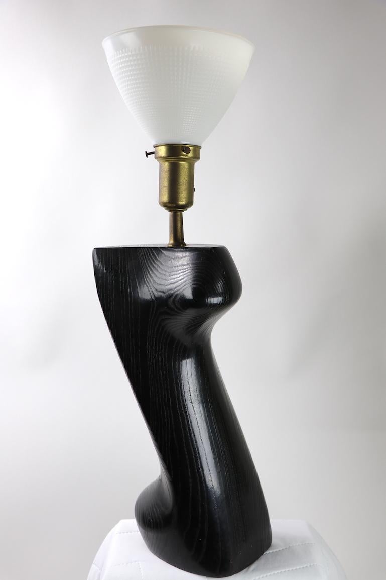 Stunning sculptural table lamp by Heifetz in black cerused oak. Organic modern design by recognized master of the style, Yasha Heifetz. Height to top of wood body 18 inches x Total H 28 in. Clean, working condition ready to use.