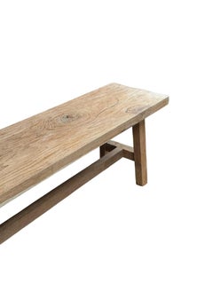 Banco escultórico de teca recuperada a mano, moderno y orgánico