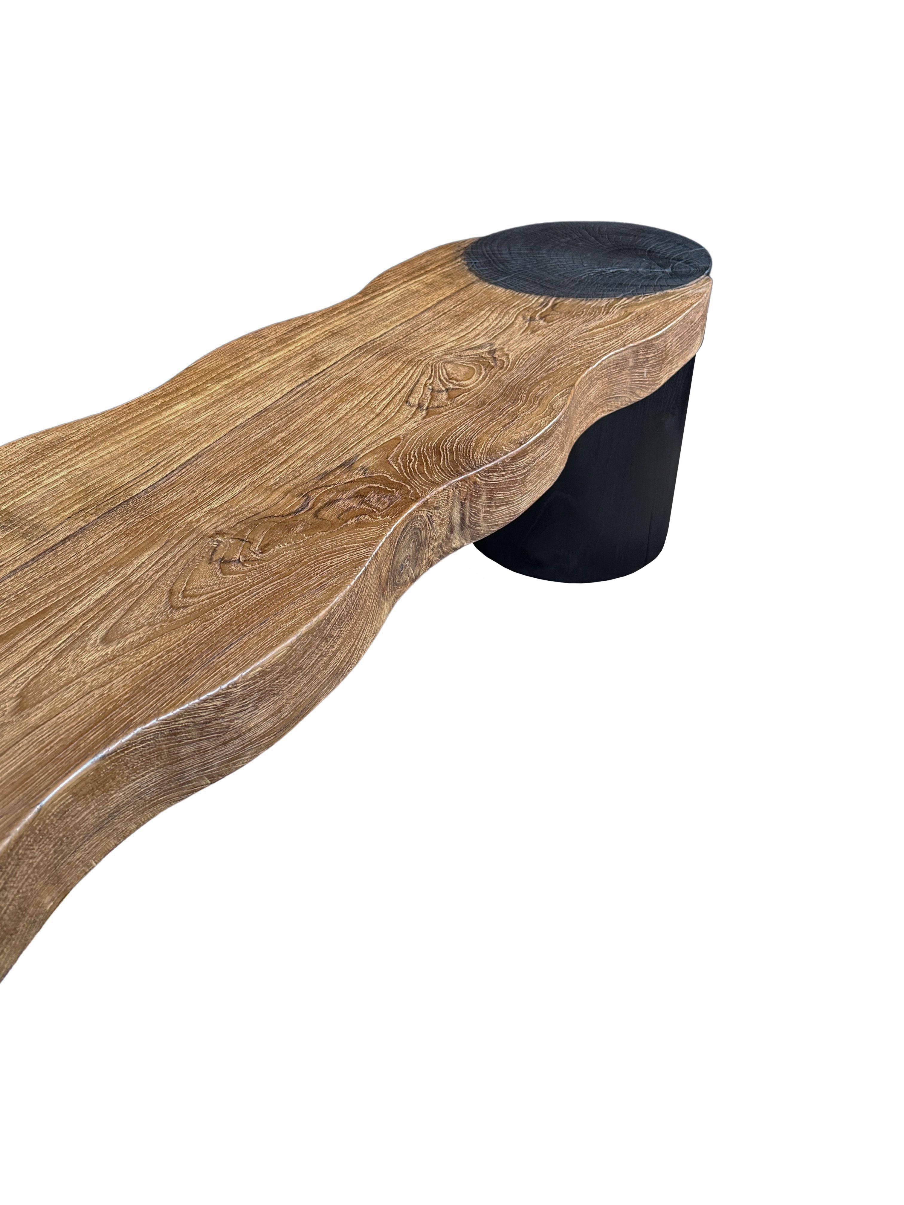 Indonesian Sculptural Teak Wood Bench, Modern Organic, Burnt & Natural Finish For Sale