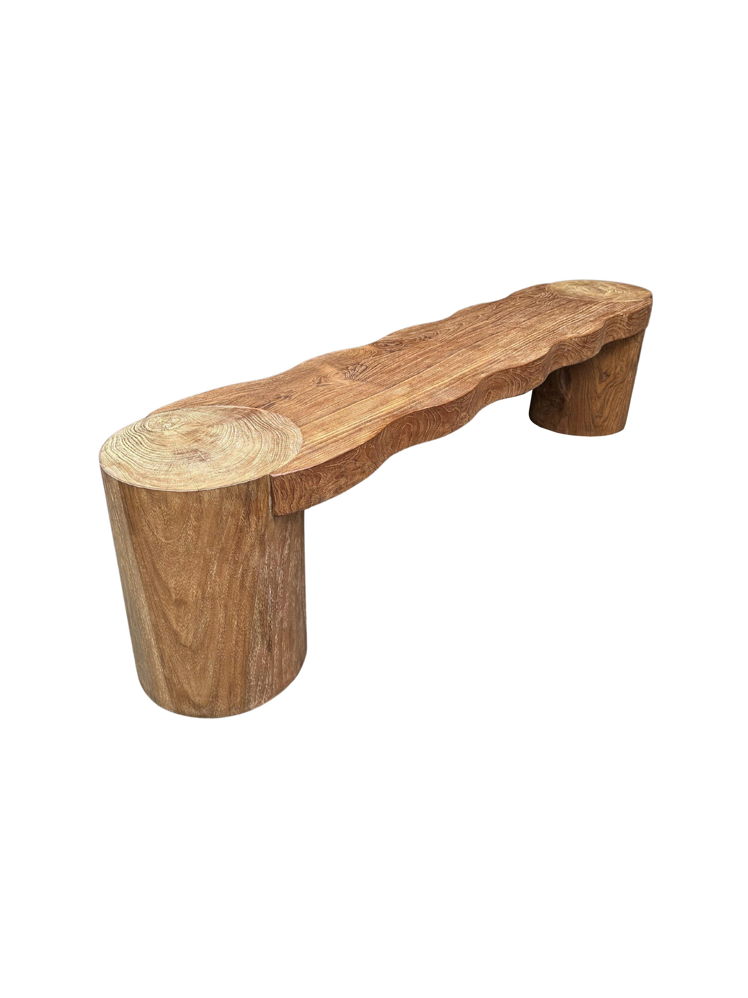 Indonesian Sculptural Teak Wood Bench, Modern Organic, Cylindrical Legs For Sale
