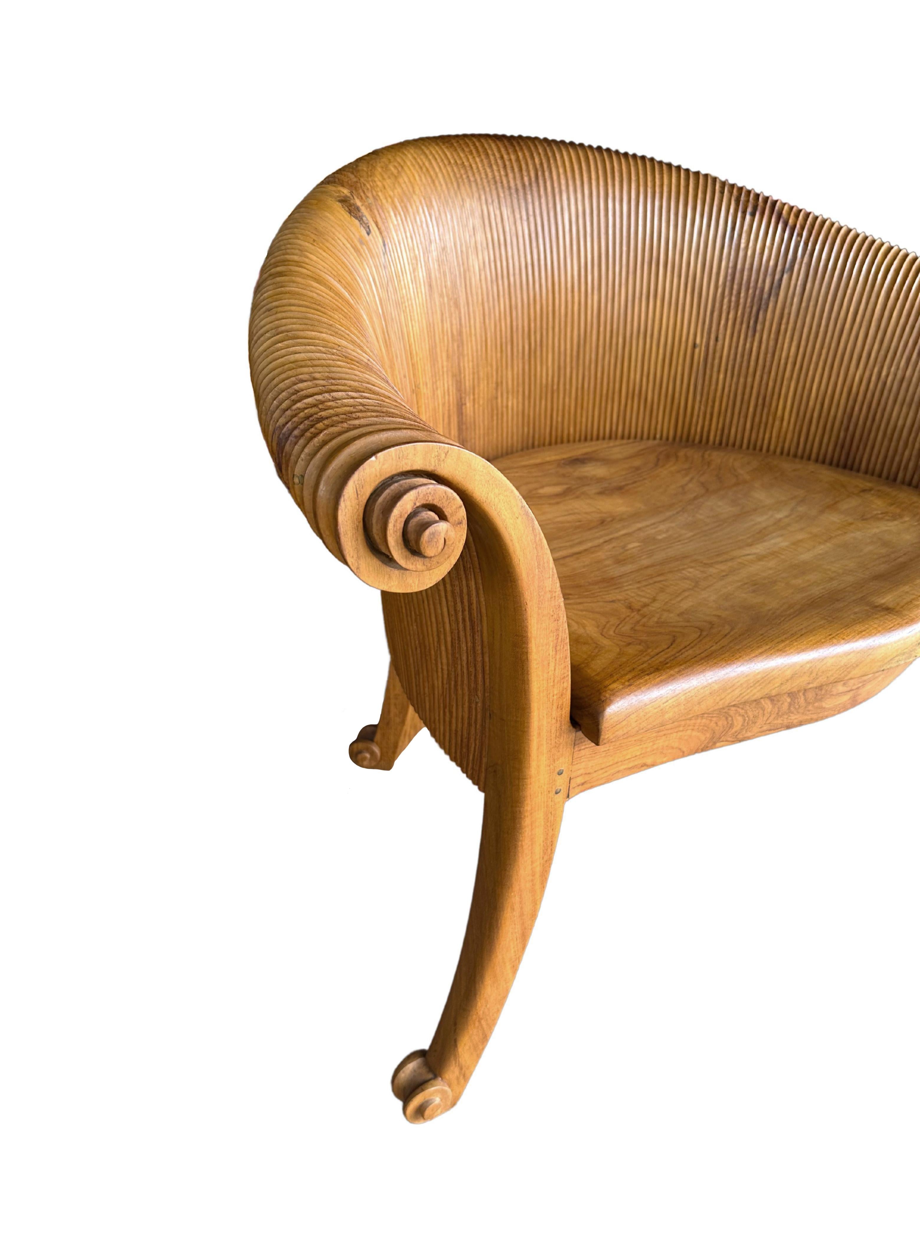 Indonesian Sculptural Teak Wood Chair with Carved Detailing For Sale