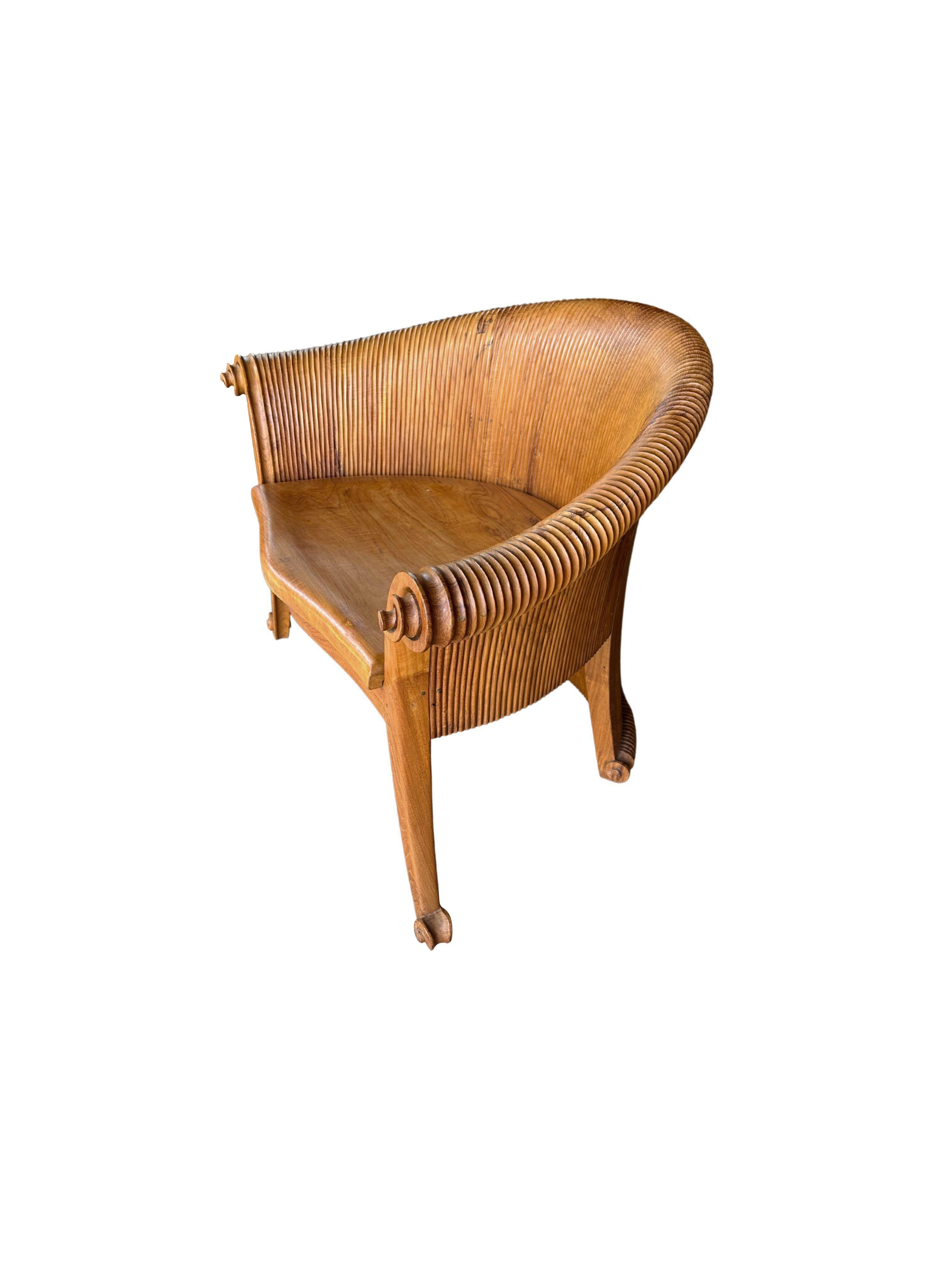 Contemporary Sculptural Teak Wood Chair with Carved Detailing For Sale