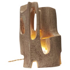 Sculptural "Travertine" lamp in sandstone