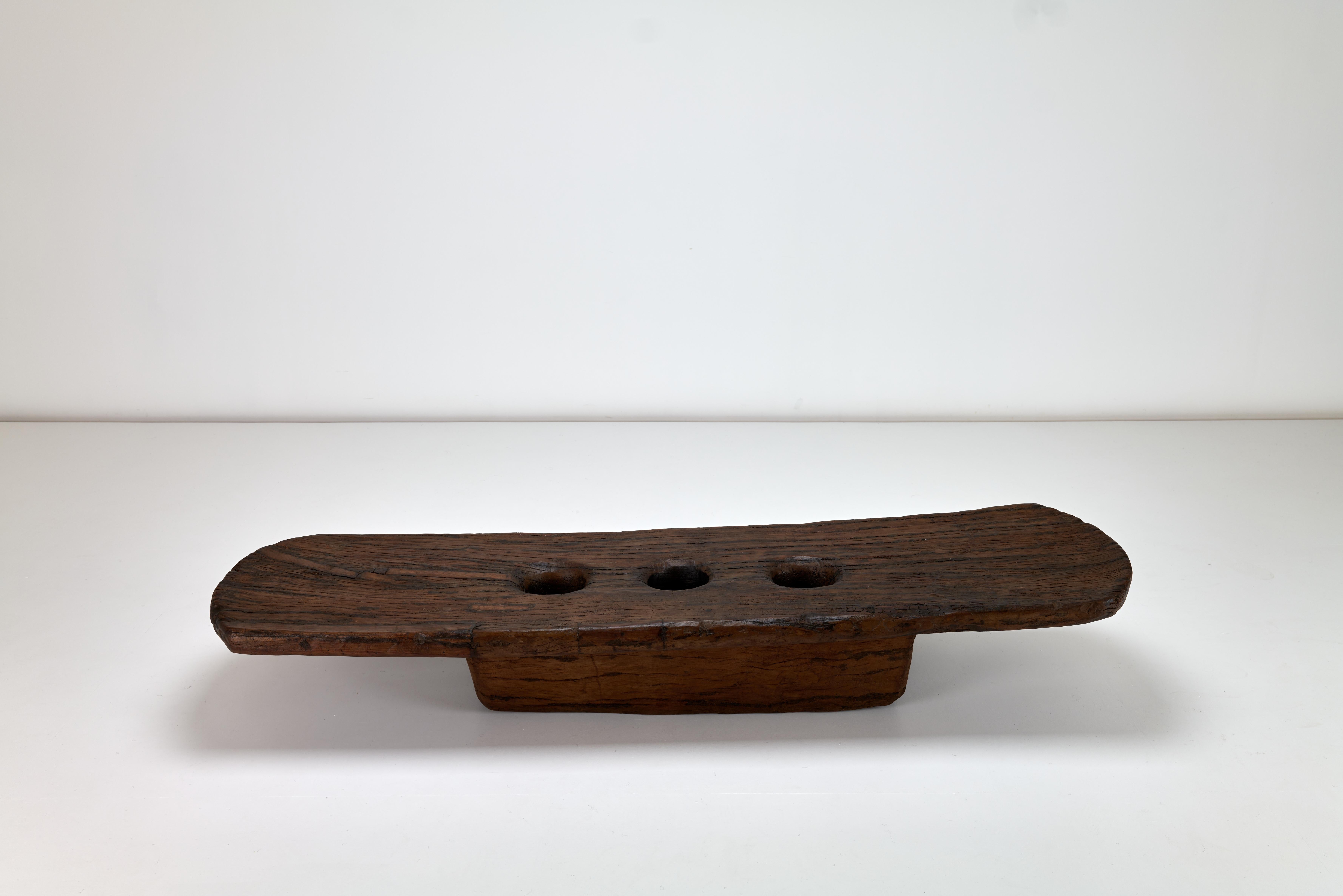 We have for sale a communal mortar from the tribal area of NE India, Nagaland. This piece would have bee used either in a large family home or as a communal piece. It was used specifically to powder rice. It is carved from a single piece of wood and