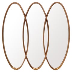 Specchio scultoreo triplo ovale dorato 49 "H. x 48 "L circa 1960