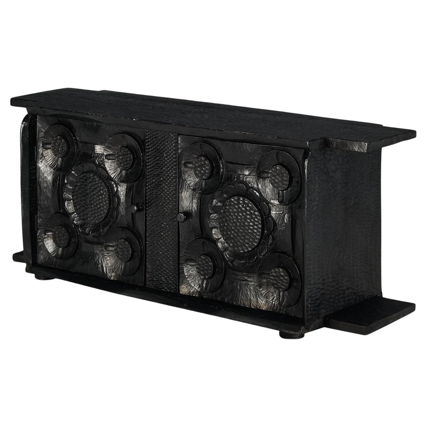 Sculptural Trunk in Black Lacquered Wood with Decorative Carvings  For Sale