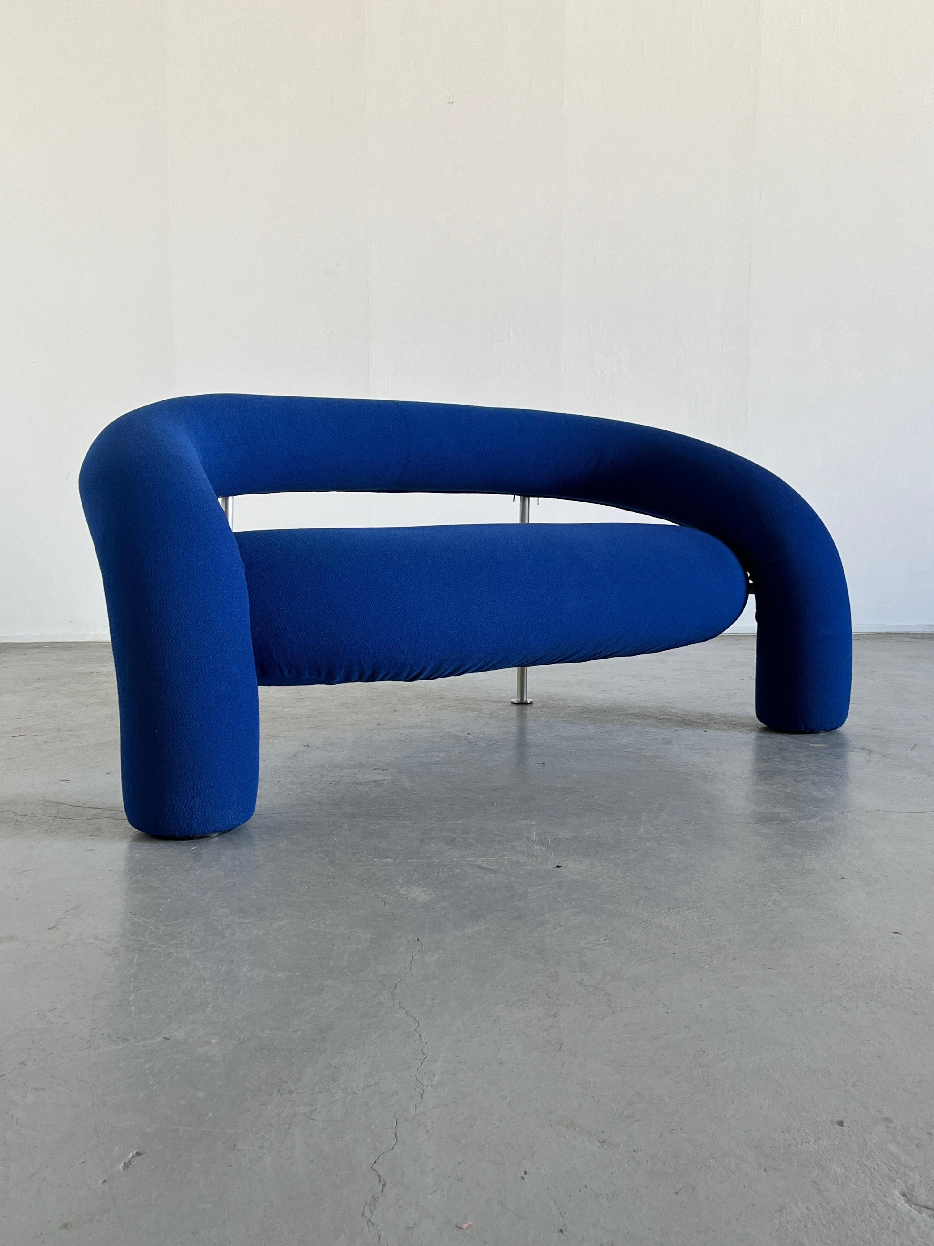 Rare sculptural postmodern designer sofa model ''Tube'' designed by Anna & Carlo Bartoli for Italian high-end furniture manufacturer Rossi di Albizzate.

The sofa features internal tubular metal frame, padding in polyurethane foams covered in soft