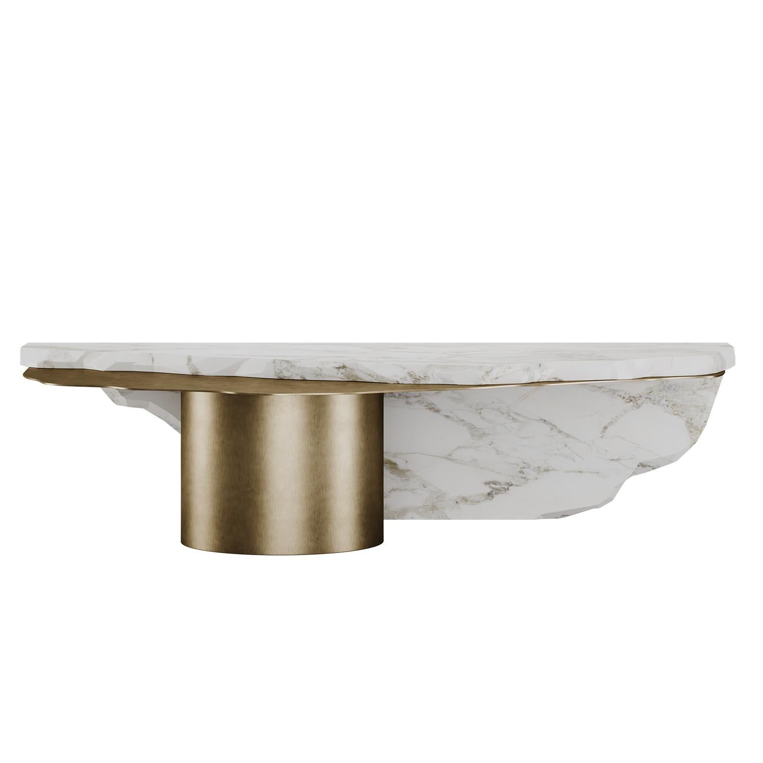 VERHEY COFFEE TABLE
The handcrafted, asymmetrical Verhey Coffee Table expresses the purity of materiality and sculptural play on form. Bridging art and design, the confluence of metal and marble with an architectural tectonic form creates a vertical