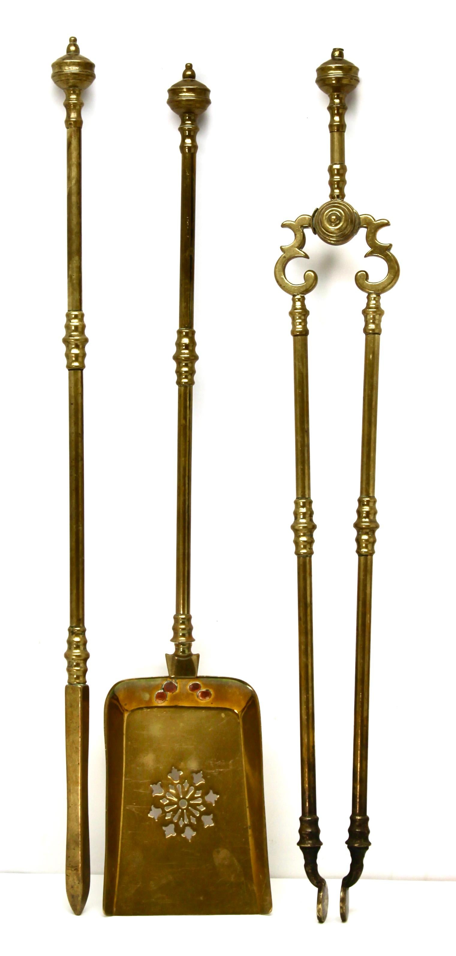 Sculptural solid brass three-piece fire tool set Circa 1870
Brass is very decorative and stylized.

Dimensions Shovel:
Height* 71 cm 27.95 inch
Width* 13 cm 5.12 inch.




     