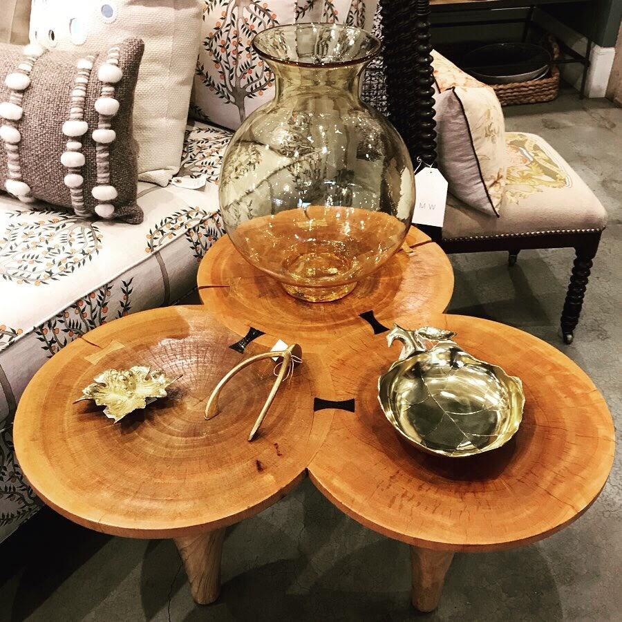A true statement piece with this very unique, sculptural vintage occasional or coffee table made from 3 stumps of wood.

Featuring hand turned triple top mahogany wood exposing beautiful grain patterns with 3 elegantly tapered elm wood legs.