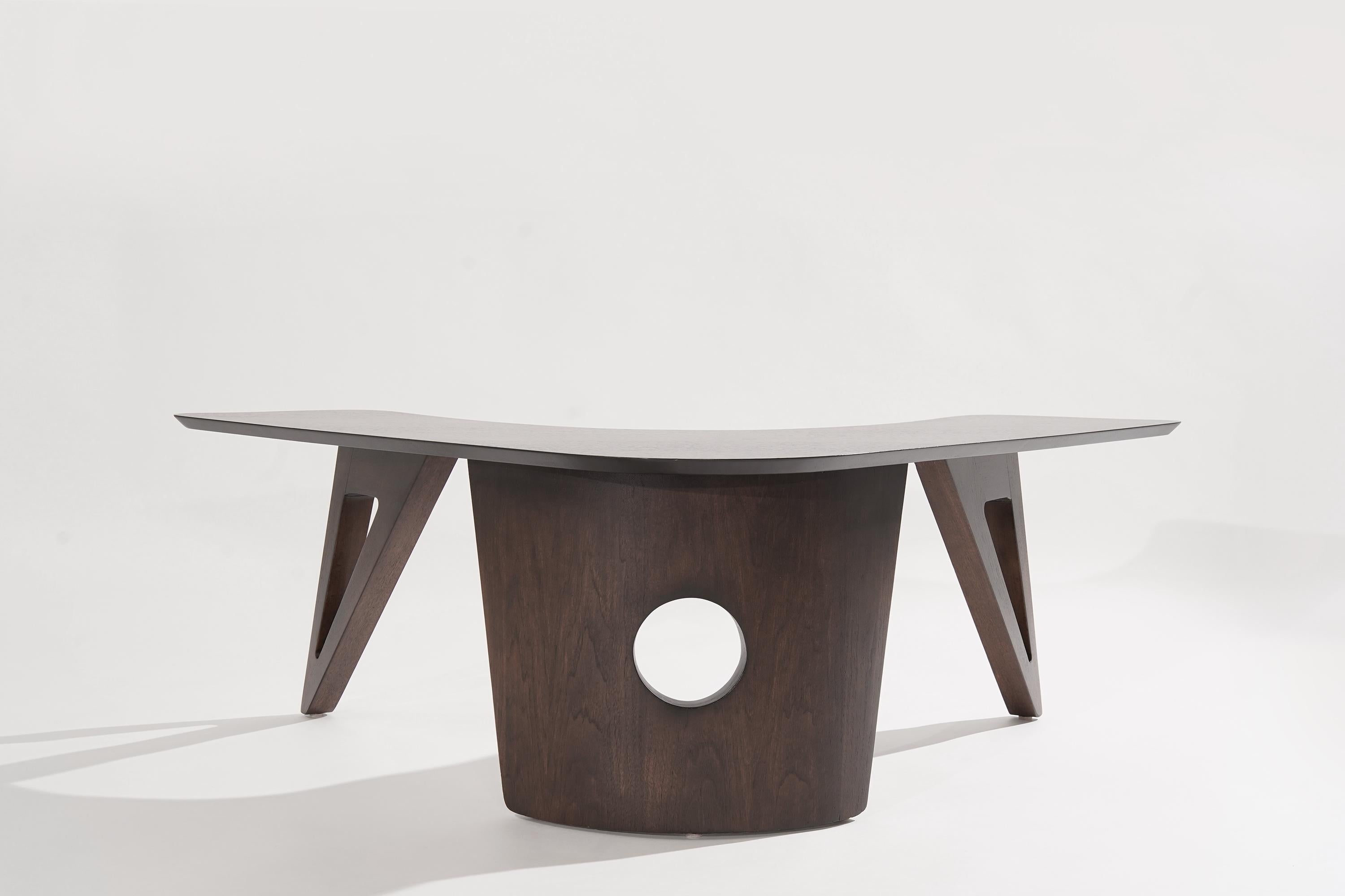 Walnut coffee table featuring a boomerang-shaped top, circa 1950-1959. Fully restored to its original espresso finish. Talk about a conversation piece!

Other designers from this period include Adrian Pearsall, Vladimir Kagan, Hans Wegner, Gio