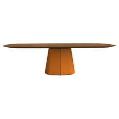 Sculptural Walnut Dining Table with Oval Shaped Top/Orange Lacquer Base