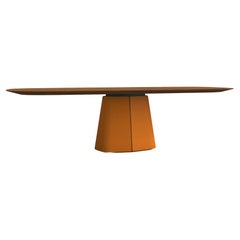 Table de salle à manger sculpturale en noyer avec plateau ovale/pied laqué orange