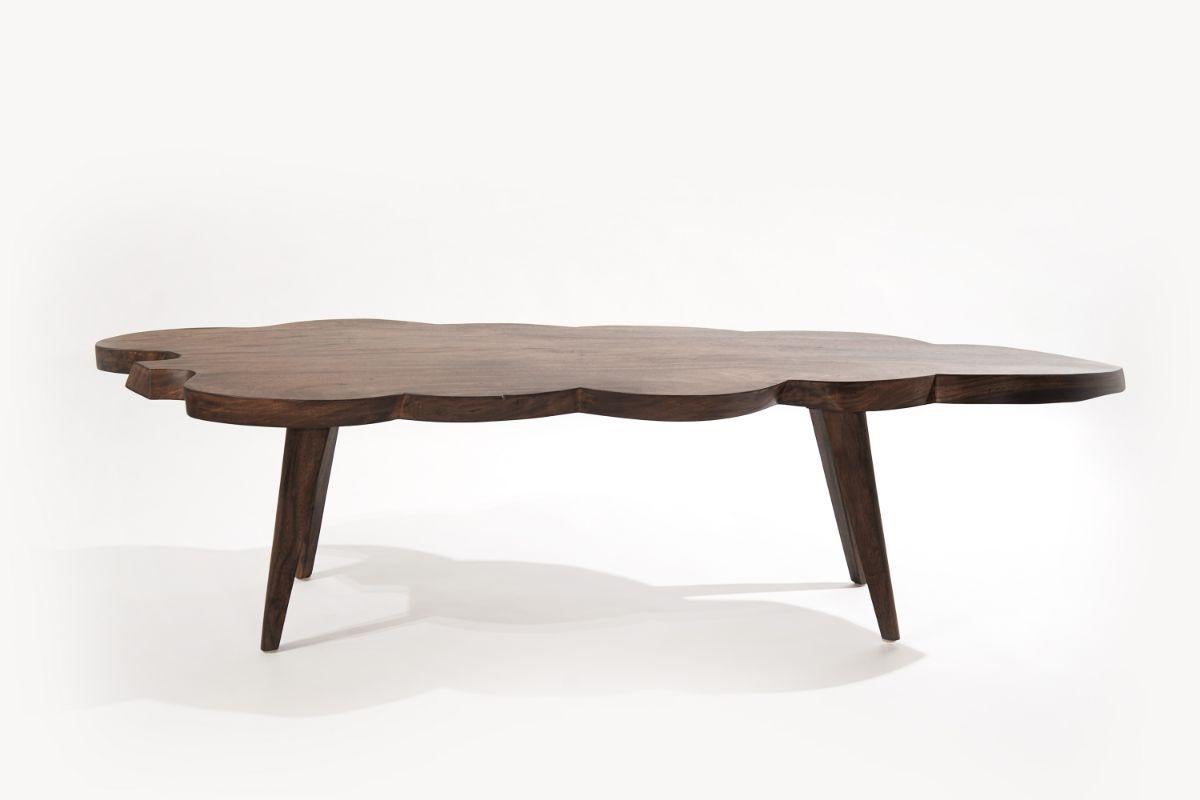 A completely restored one-of-a-kind artistically crafted live edge coffee table executed in walnut, featuring an organic shape and matte finish.

Other designers from this era include Paul McCobb, George Nakashima, Tommi Parzinger, and T.H.