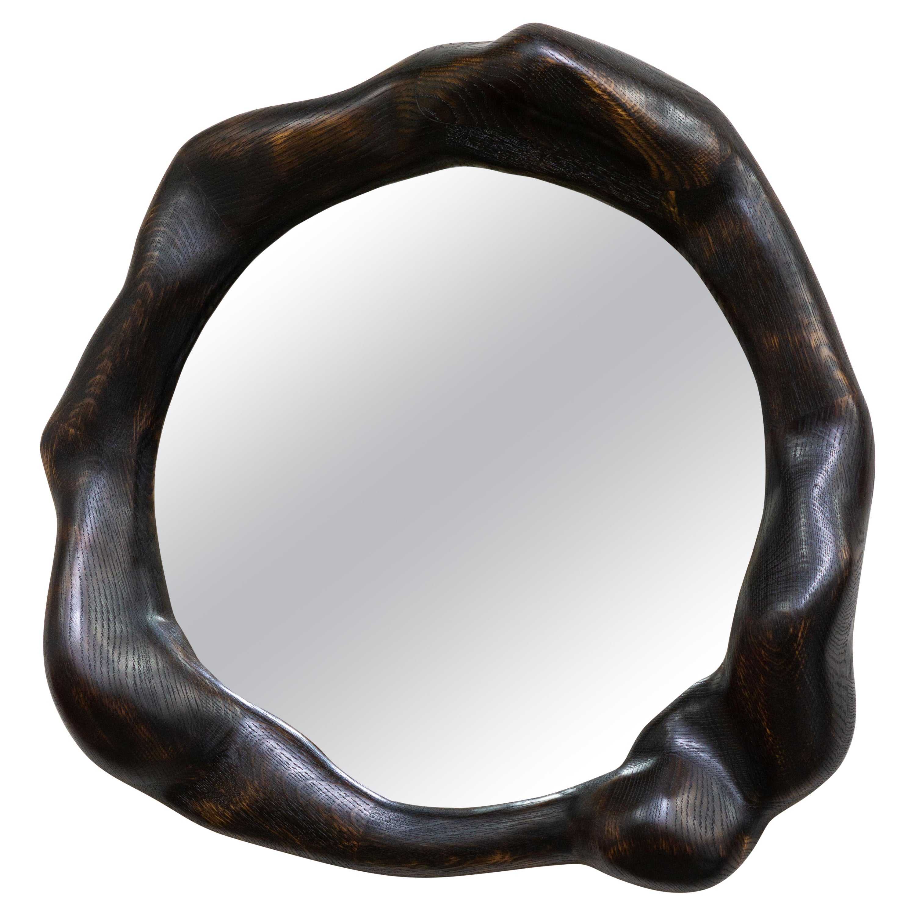 Miroir sculptural ondulé en chêne calciné