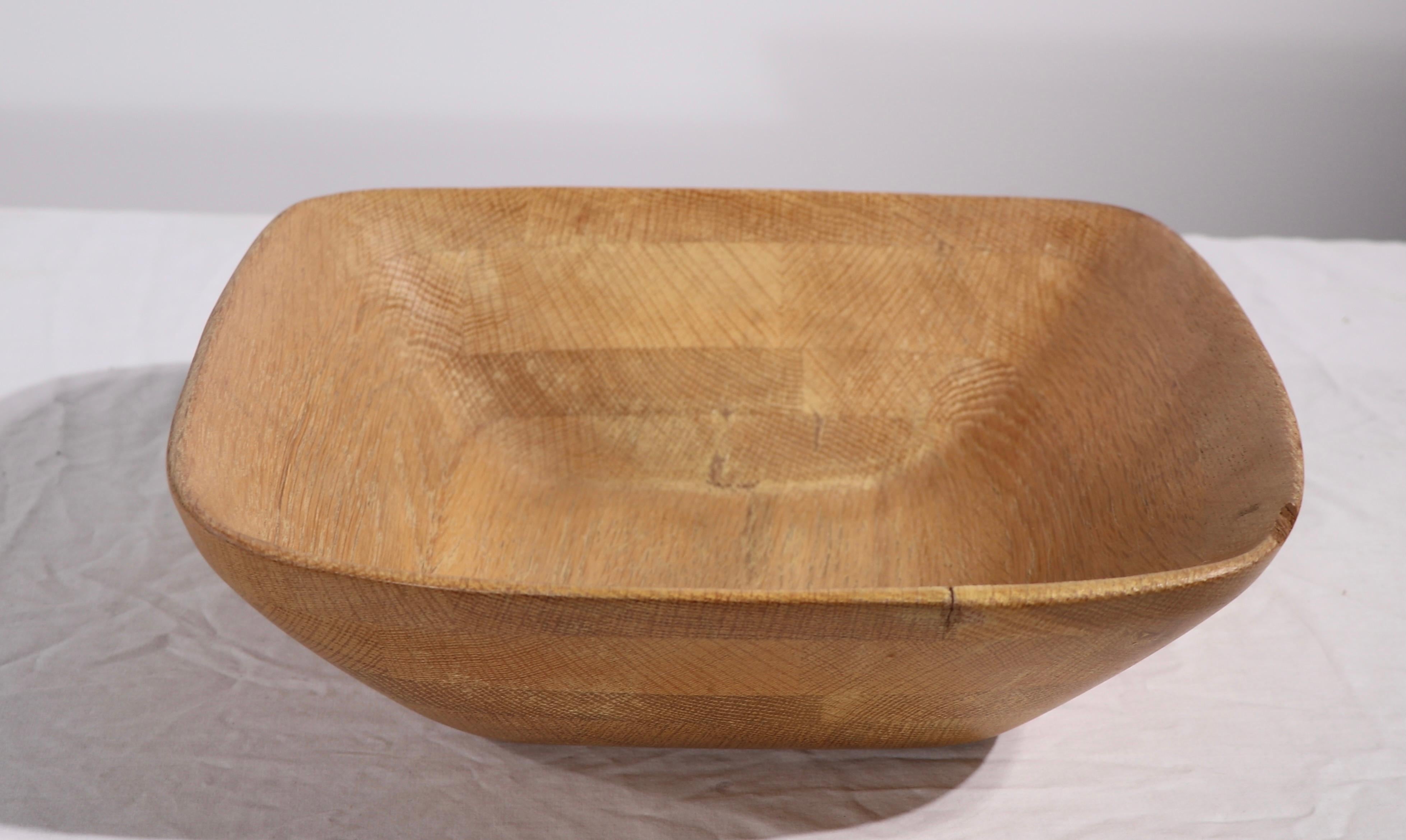 Hard to find example of the work of Mark Wright. This wood bowl is in good condition, however does show a small chip, and a slight split at the top edge, please see images. Fully and correctly marked, it has both the script signature and the Frosted