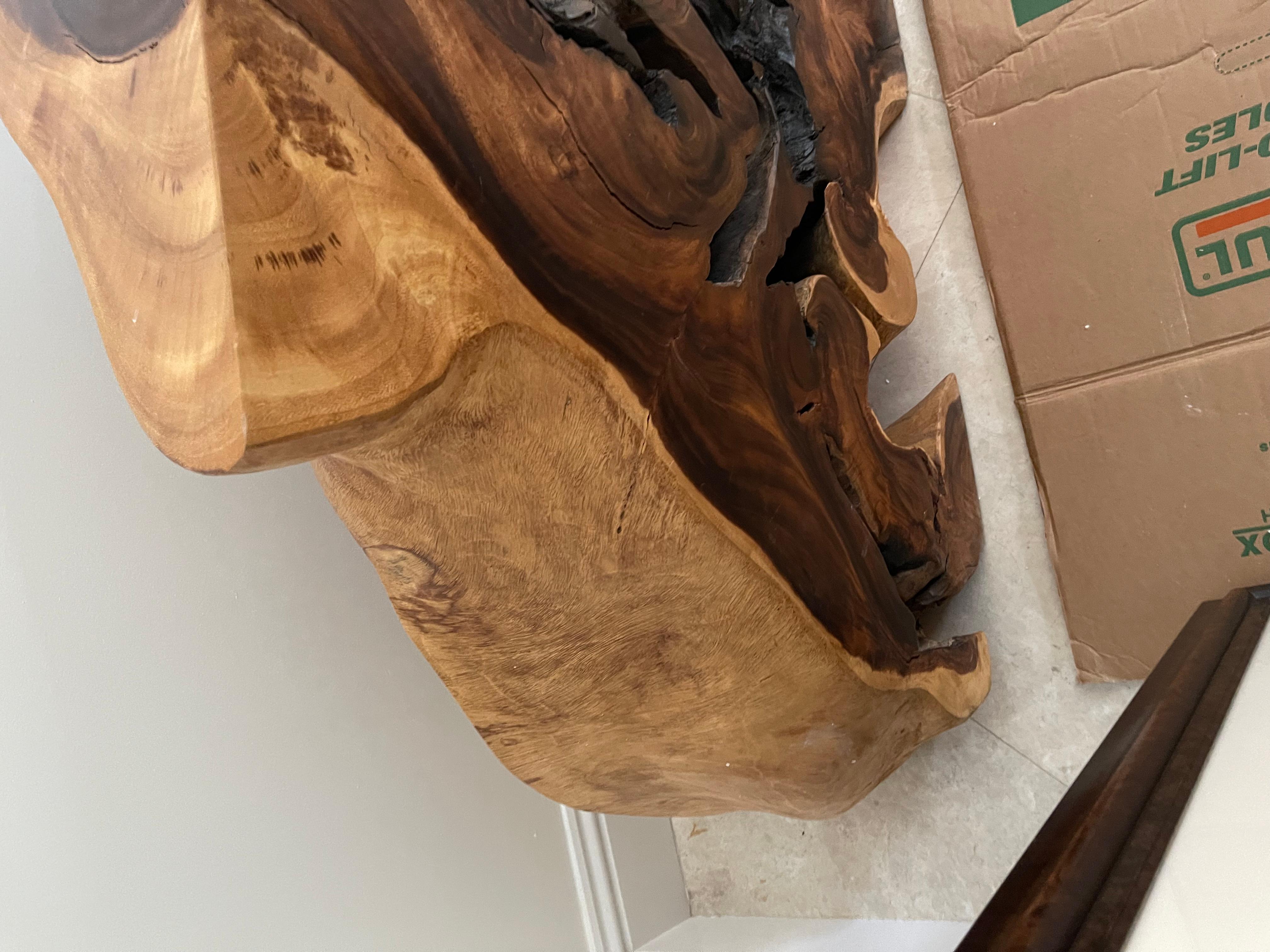 This amazing console has a lot of character. The light and dark colors flow so nicely throughout the piece. In a slice of tree this large you should expect a few tiny hairline fractures. Please look closely at the photos as part of the description.