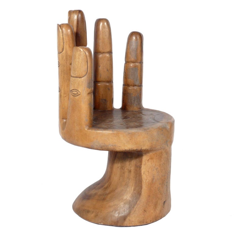 Sculptural wooden hand chair, handmade and unique, in the manner of Pedro Friedeberg, probably Mexican, circa 1960s. Retains it's warm original patina.