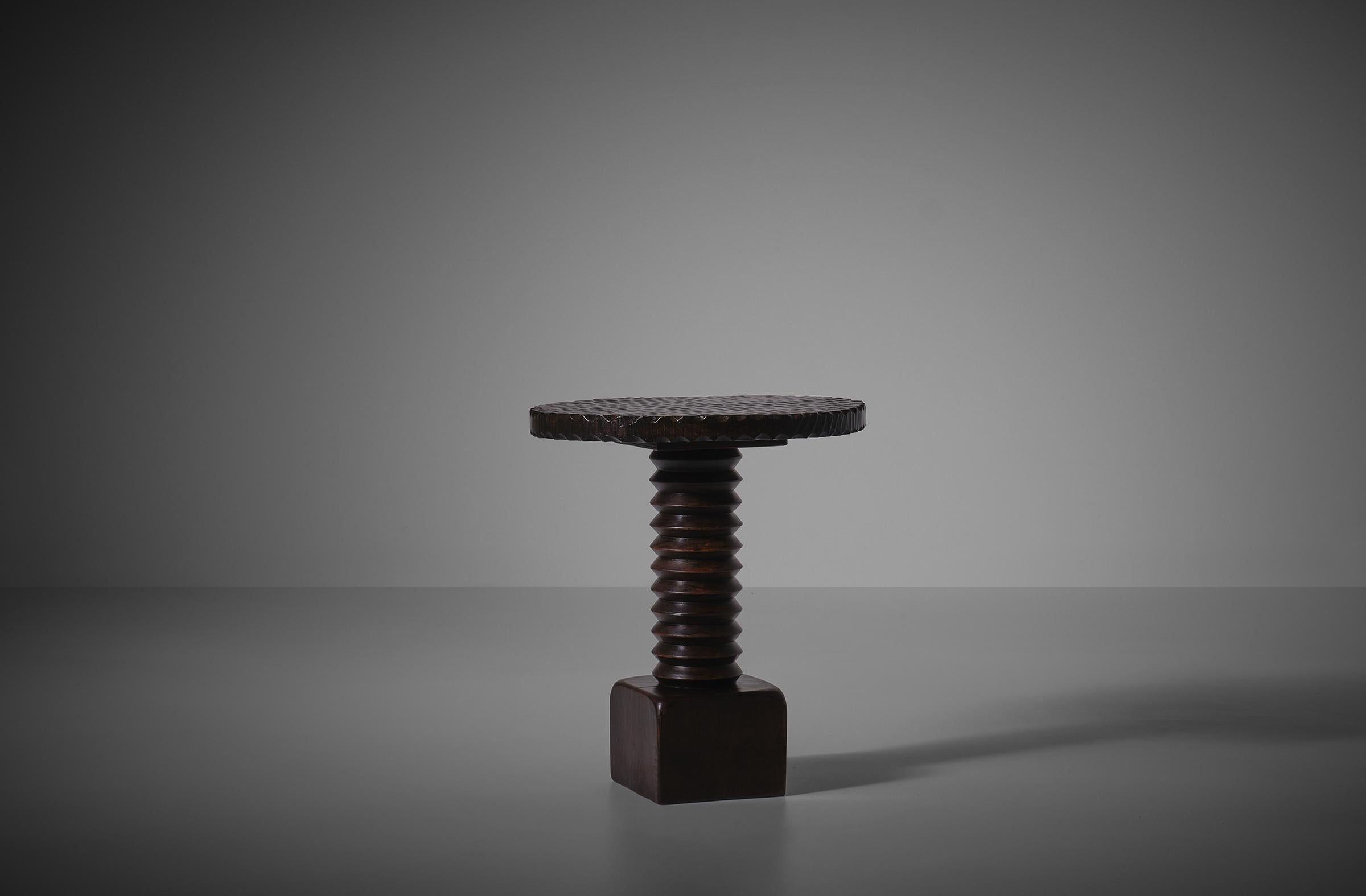 Unique side table, France 1940s. Distinctive sculptural table crafted out of solid dark stained oak. The beautifully hand carved dark stained oak table top rests on a corkscrew shaped centre collum on a nice contrasting cube, all in one piece. The