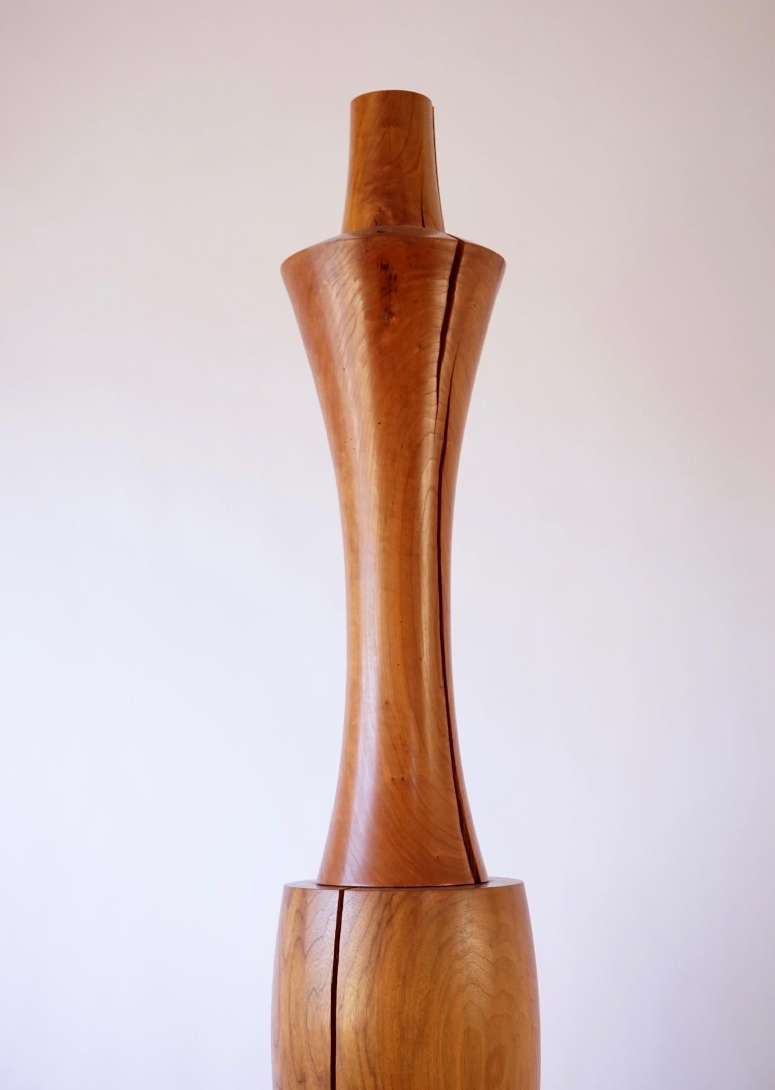 The Totem #2 was made on a custom built lathe in the Lehrecke studio and is a modern take on the Totem tradition. Turned by a master craftsman with locally sourced walnut and cherry.  Totem #2 is turned in three sections with a 1 1/4