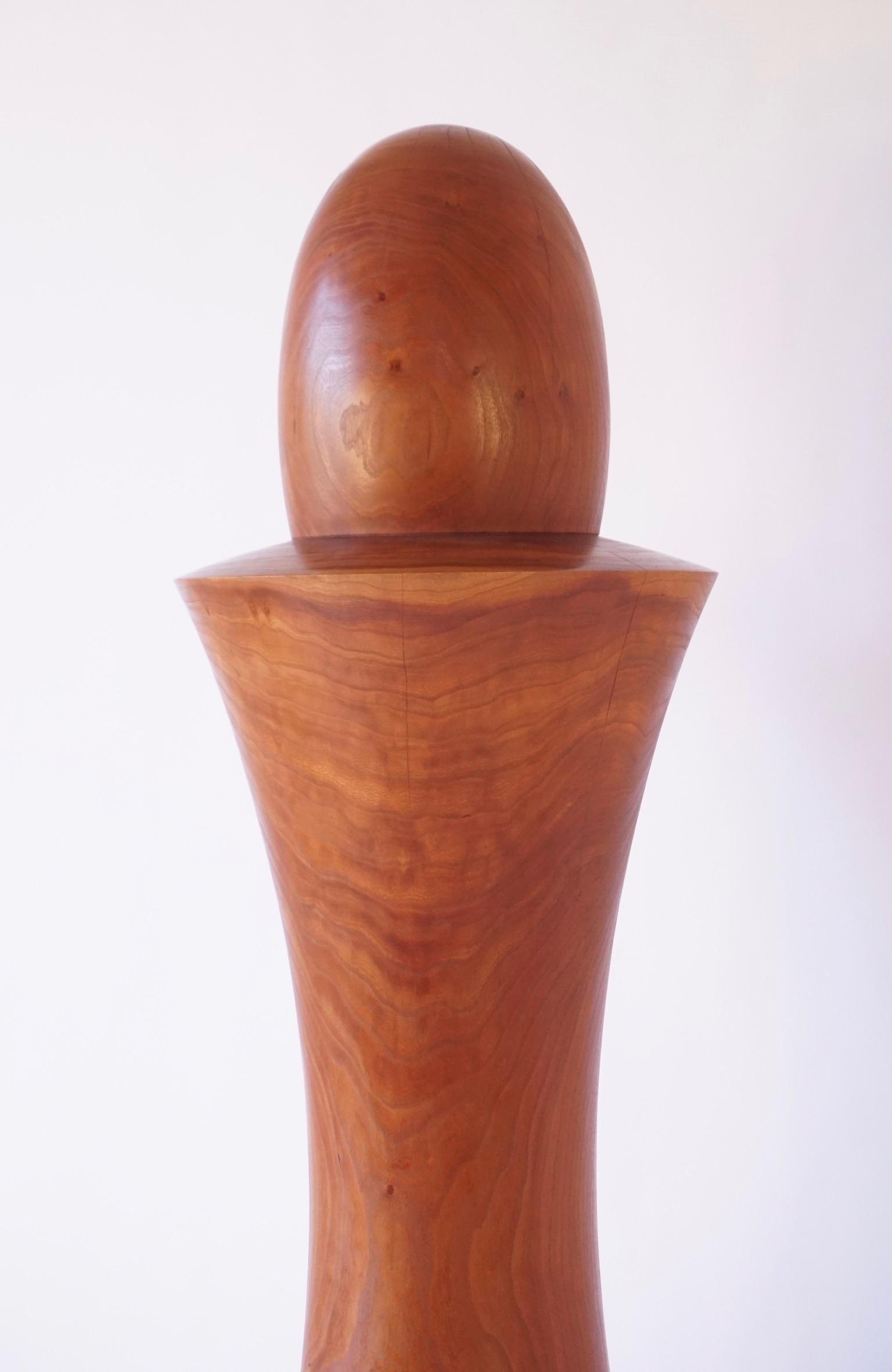 The Totem #4 was made on a custom built lathe in the Lehrecke studio and is a modern take on the Totem tradition. Turned by a master craftsman with locally sourced walnut and cherry.  Totem #4 is turned in two sections with a 1 1/4