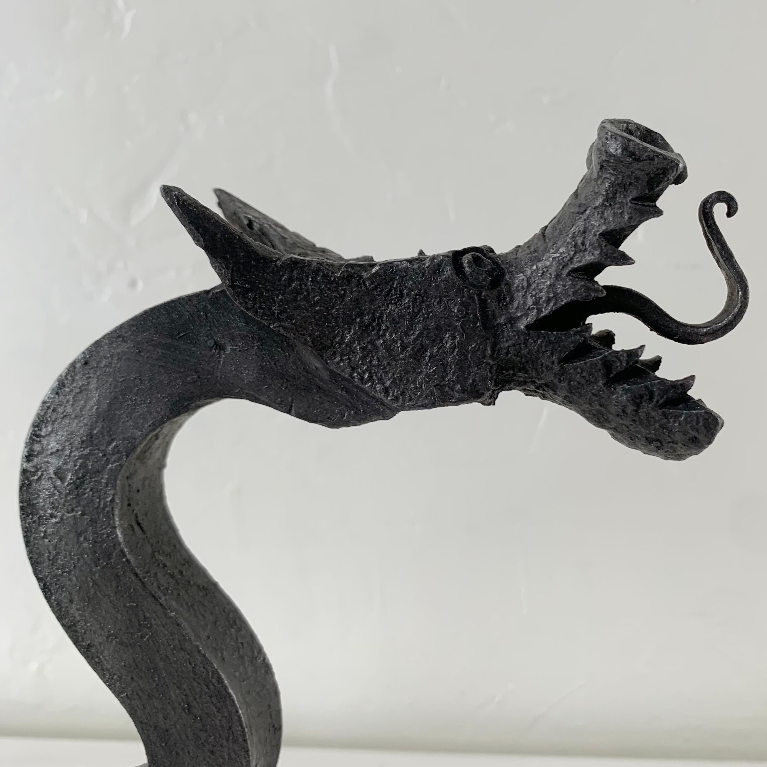 20th Century Sculptural Wrought Iron Pair Of Dragons Andirons, circa 1910, United States. For Sale