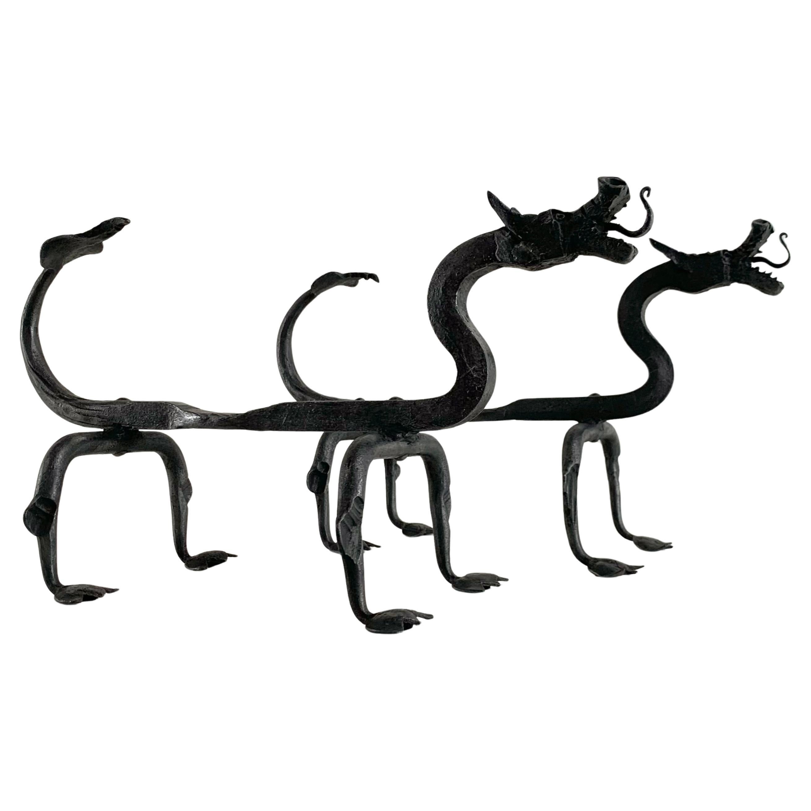 Sculptural Wrought Iron Pair Of Dragons Andirons, circa 1910, United States. For Sale