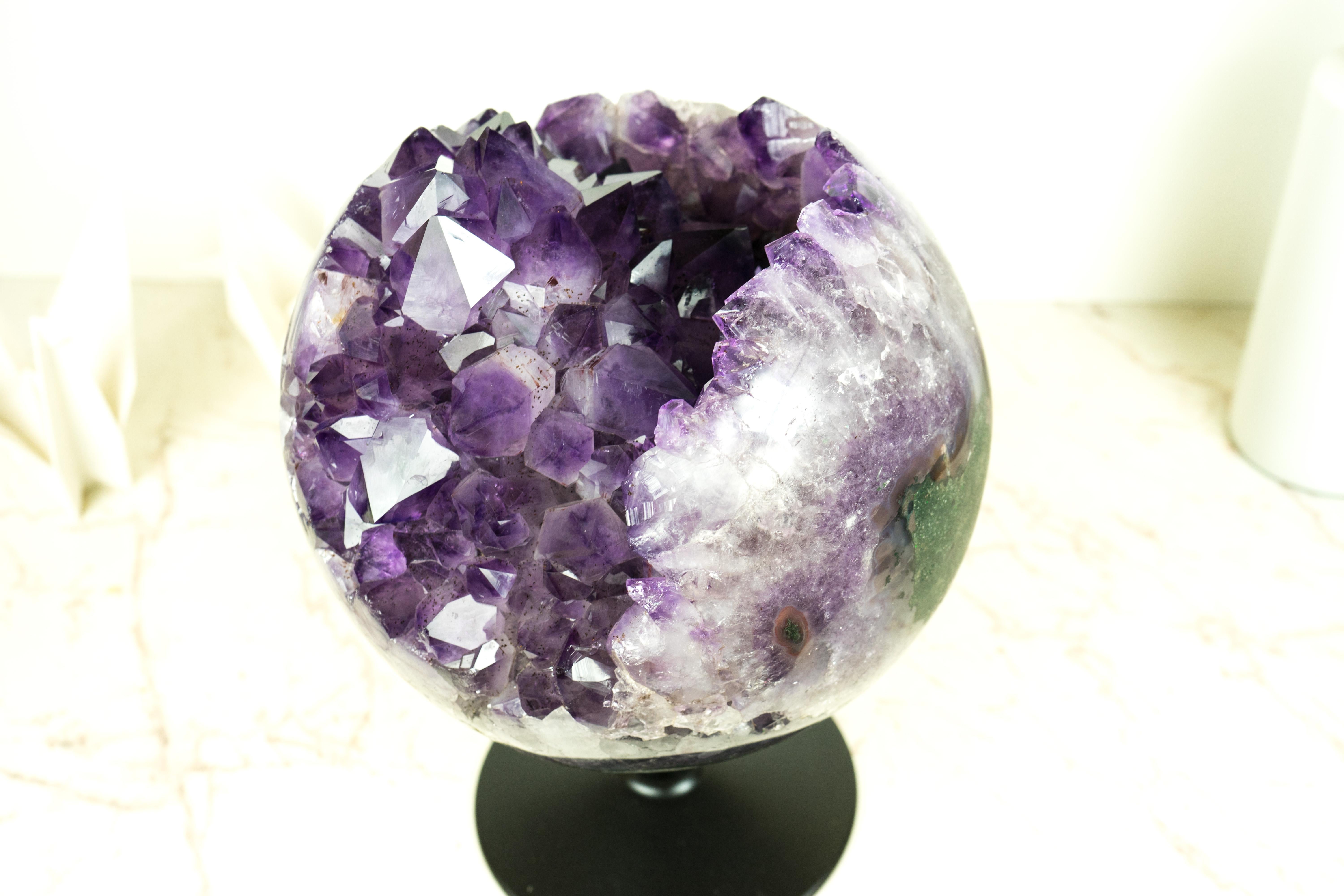 Rare Amethyst Sphere with Large, Intact, Purple Crystals: A Natural Statement Crystal Sphere

▫️ Description

This exquisite X-Large Amethyst Sphere is a rare and extraordinary specimen that showcases the finest deep purple amethyst crystals. With