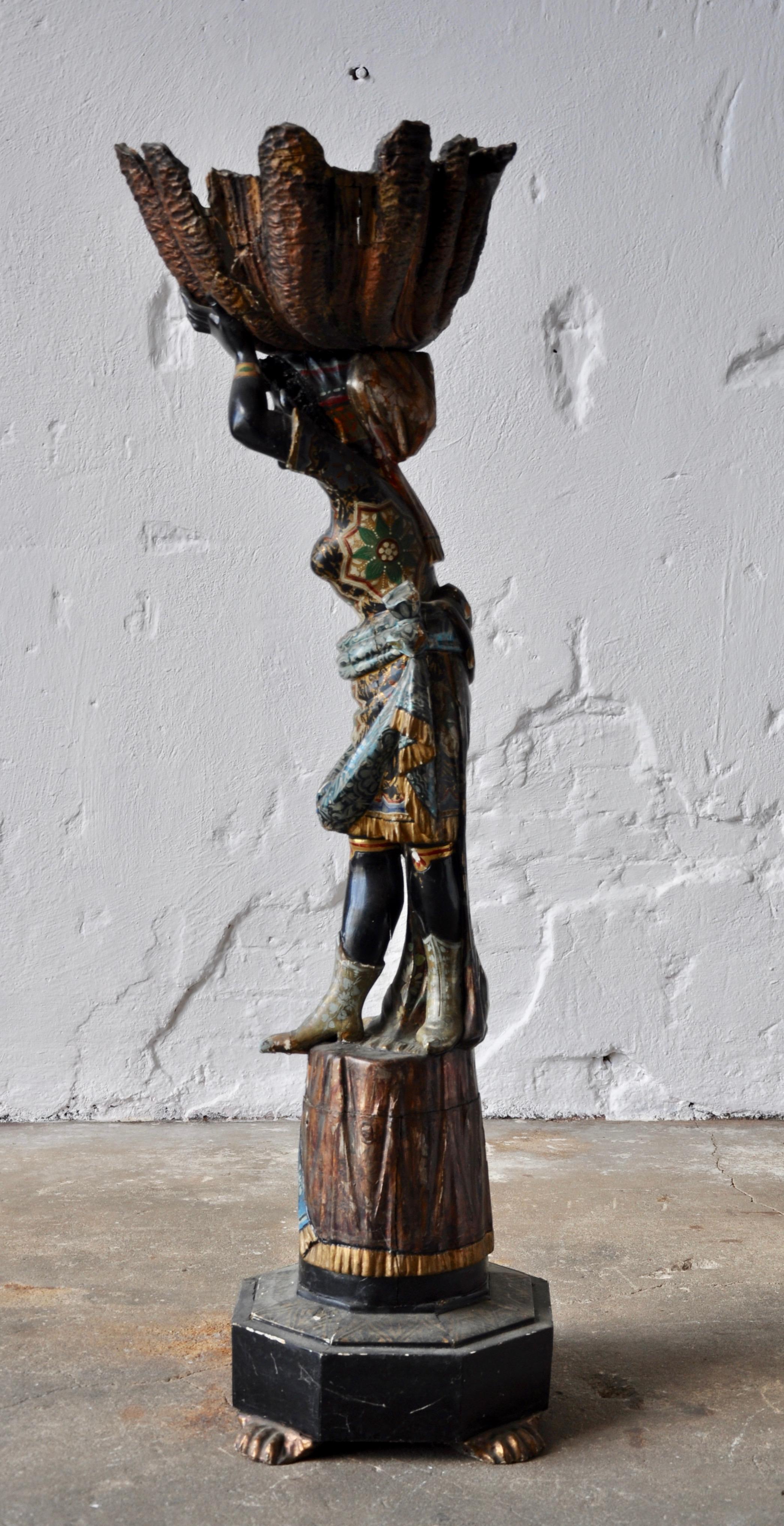 Spanish Colonial Sculpture, 1900s, in the Form of Morian with Supporting Snail, Woodcut, Painted For Sale